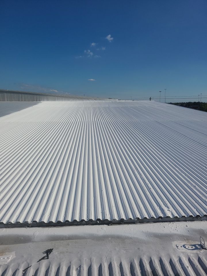 Commercial Metal Restoration System using Aldocoat Coatings by Hostetler Roofing