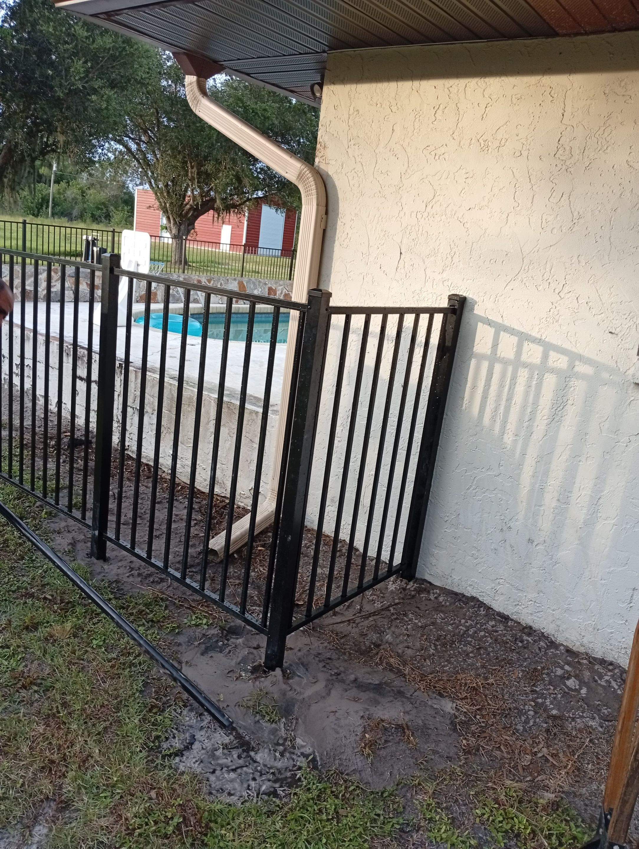 Black Aluminum Pool Safety Fence Installation in Punta Gorda by True Fence LLC