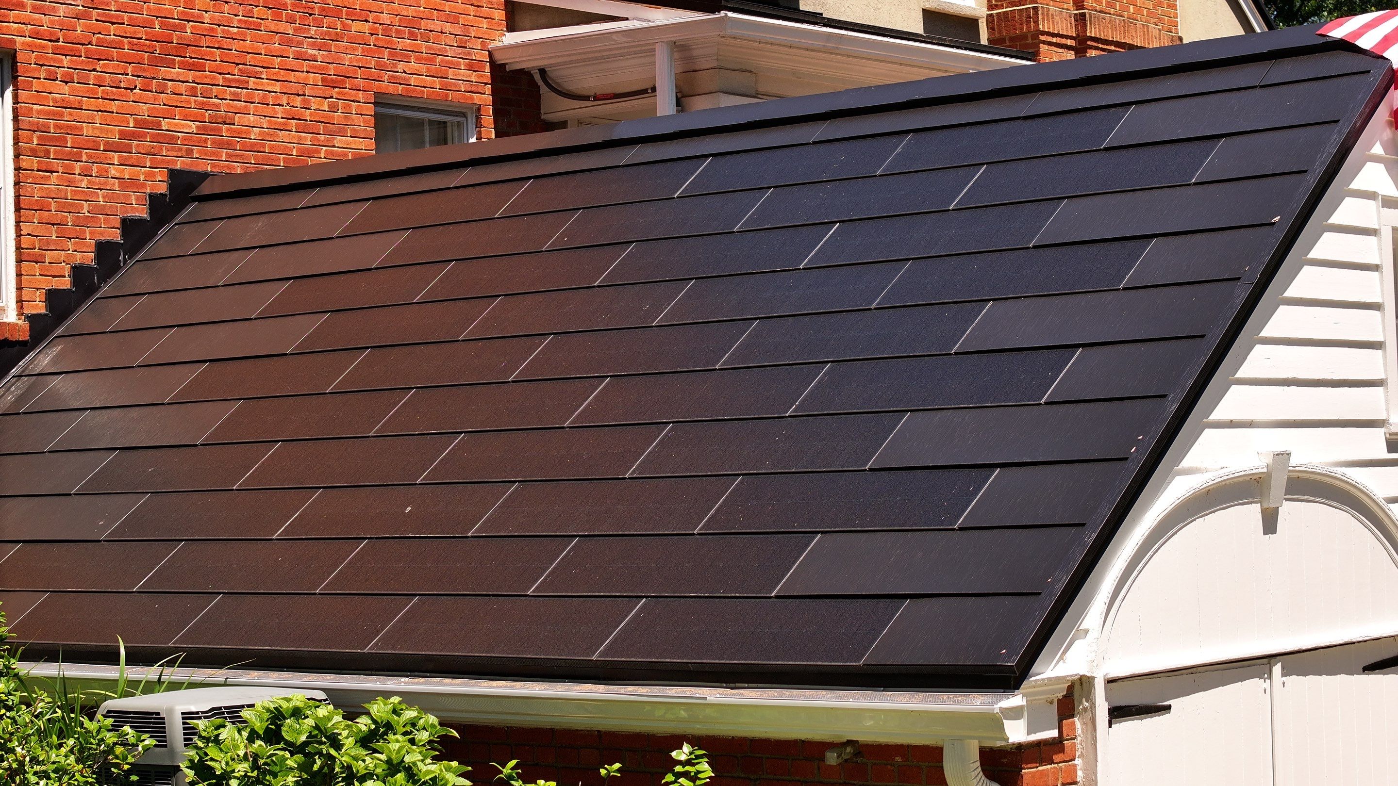 Sleek Tesla Solar Roof + Powerwall Installation | Alexandria, VA by American Home Contractors
