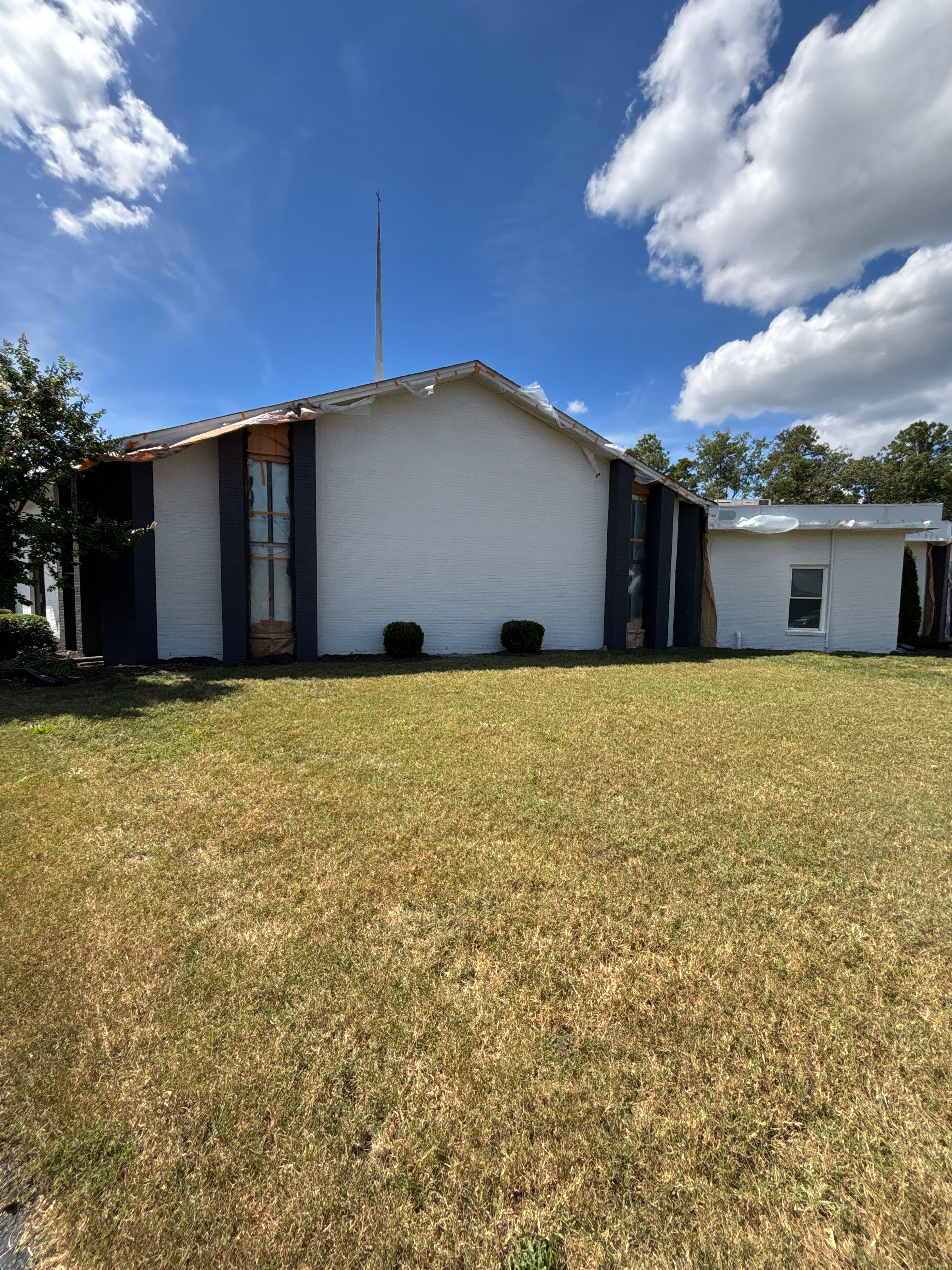 Church Exterior Brick Painting with Romabio Masonry Flat by Highfill Painting