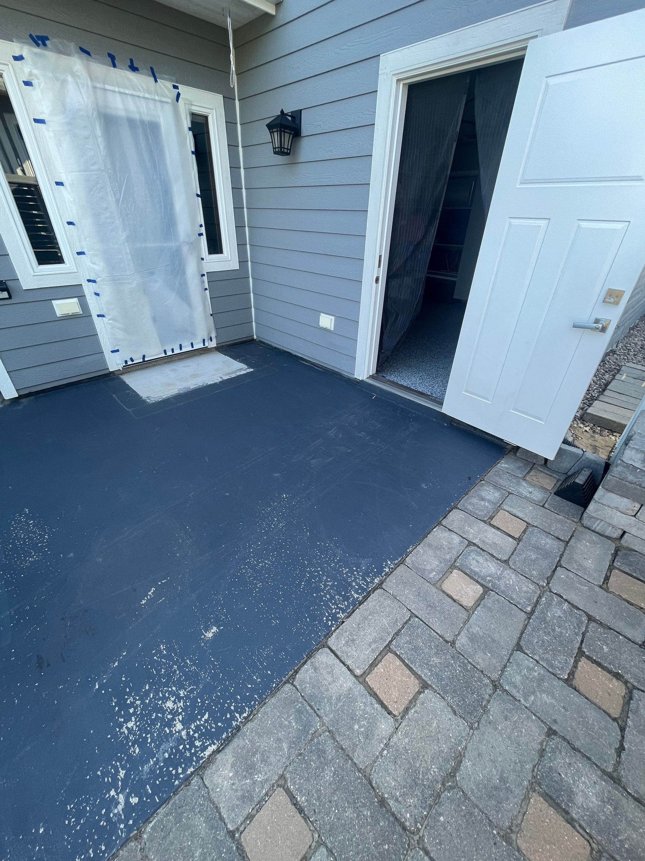 Concrete Patio Coating with Fuzzy Wool Finish in Sioux Falls by Select Painting, Coatings & Garage Cabinets