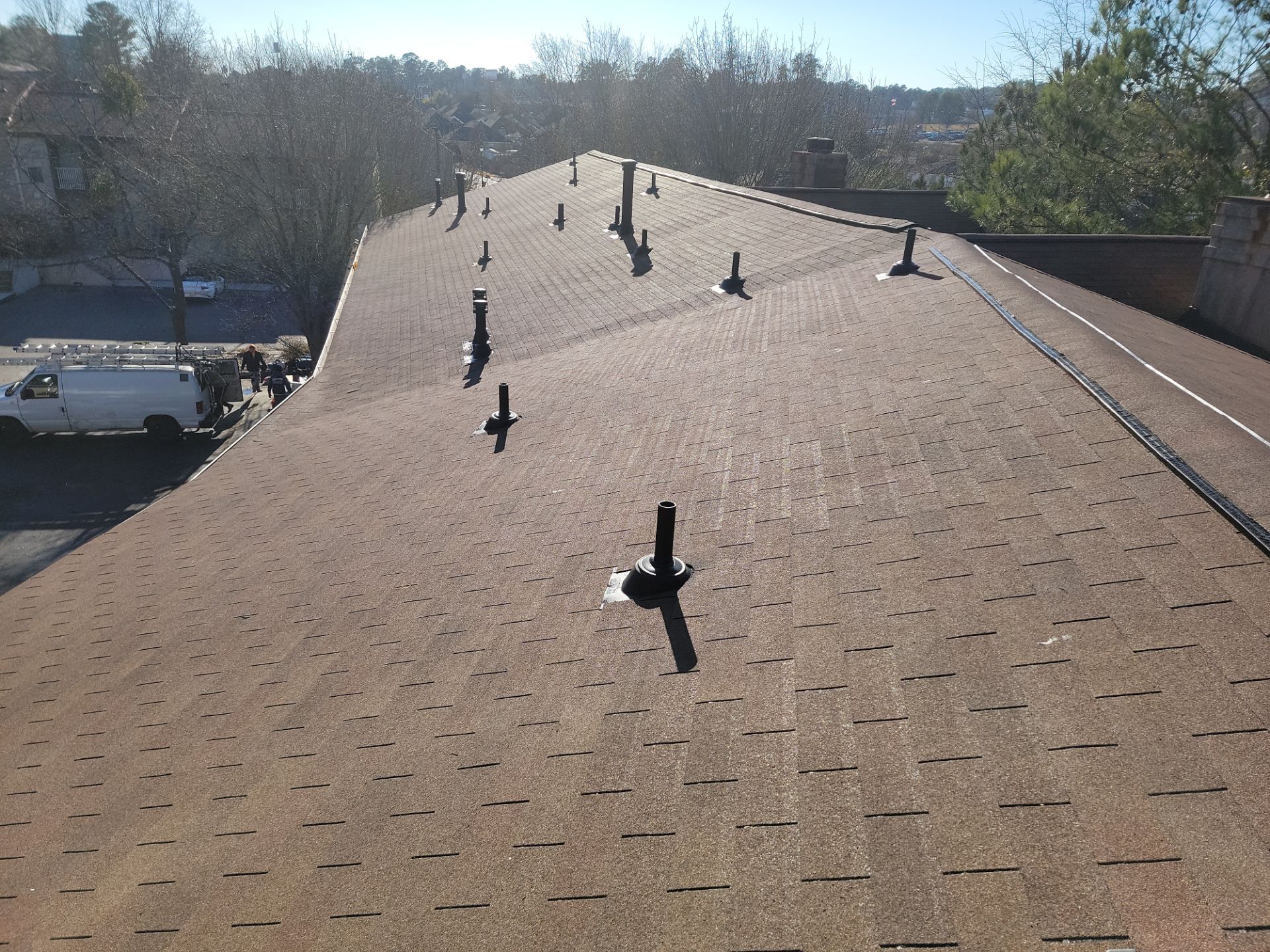 Commercial Roofing Installation using Owens Corning Autumn Brown by Inspector Roofing and Restoration