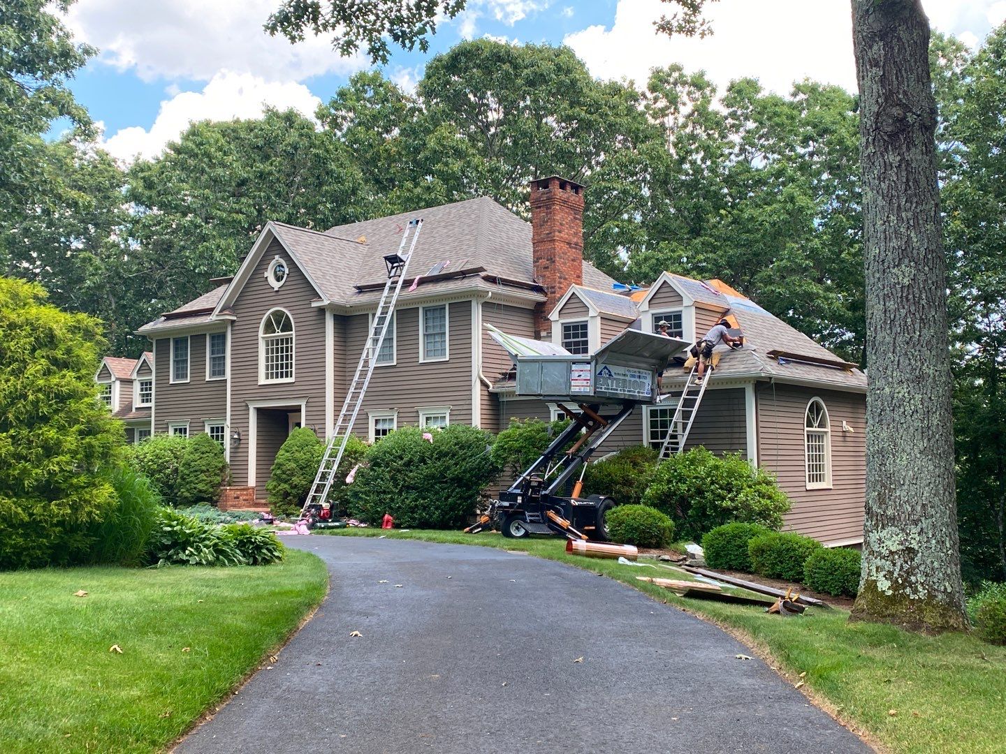 Residential Roofing Installation using Owens Corning Duration Driftwood by A Plus Exterior