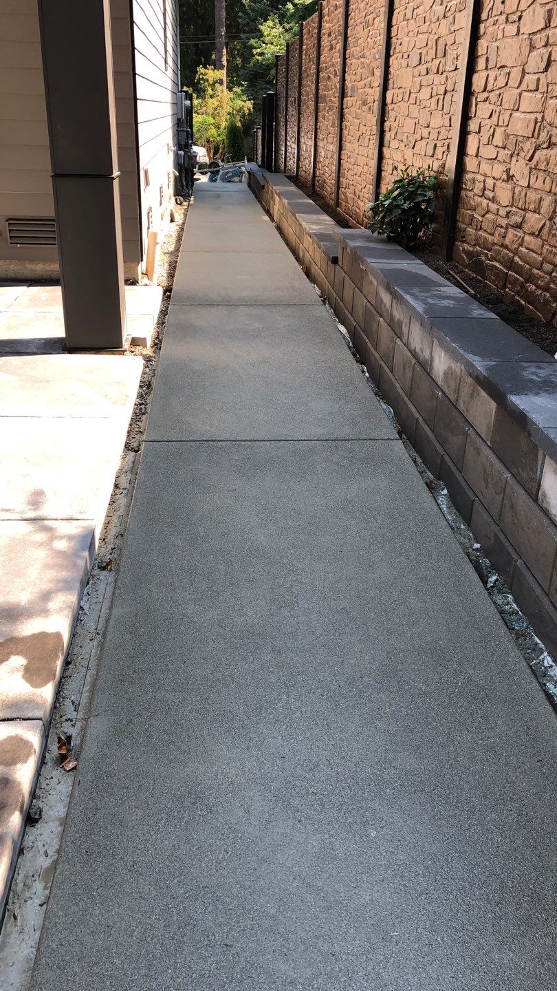Bruce | Broom Finish Driveway, Concrete Project by Jireh Asphalt & Concrete Inc 
