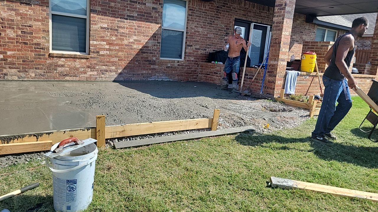 Concrete slab with Pergola by Clays Services Inc