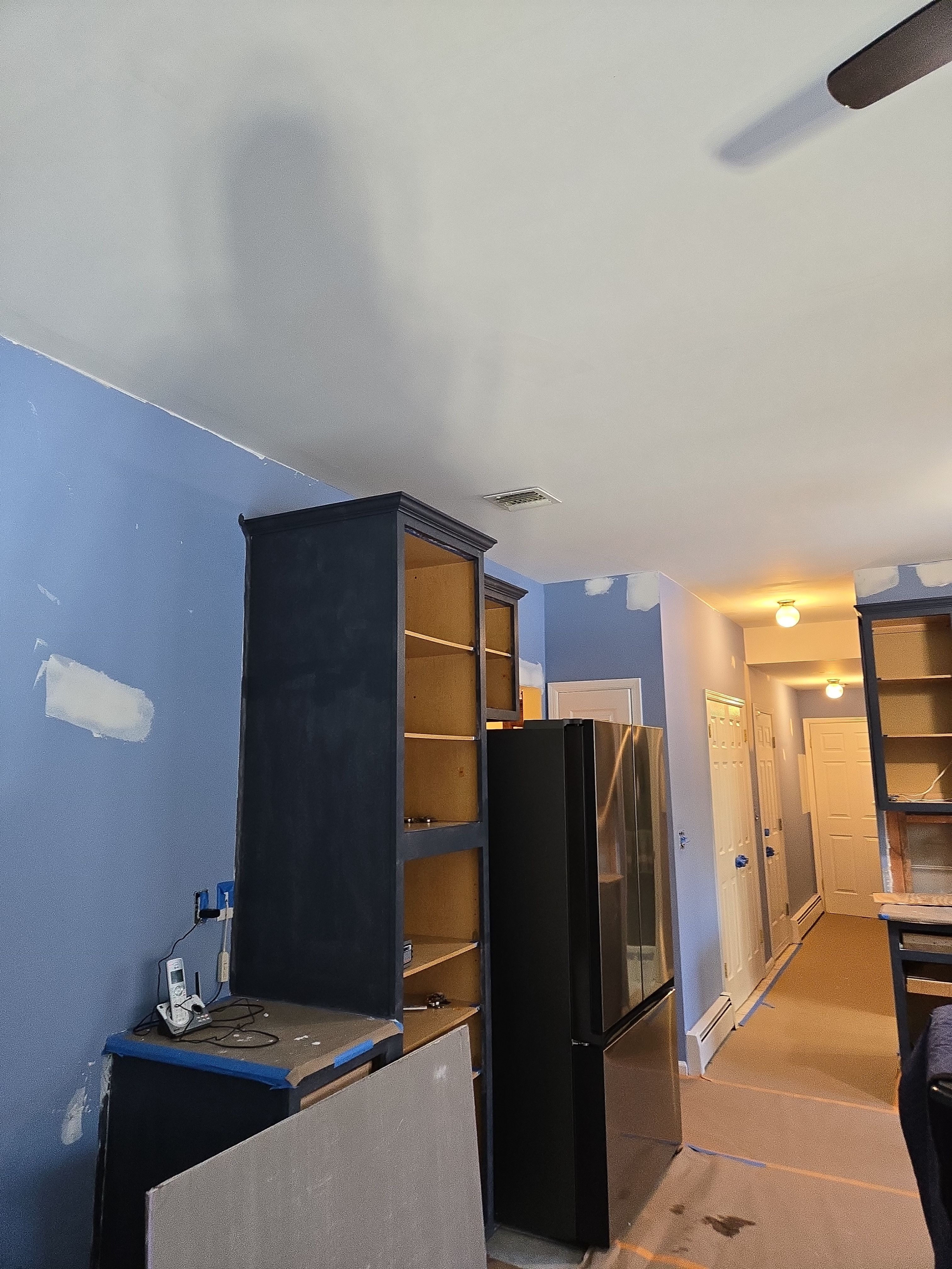 Cabinet Refinishing using Benjamin Moore Command by Spectrum Painting, LLC