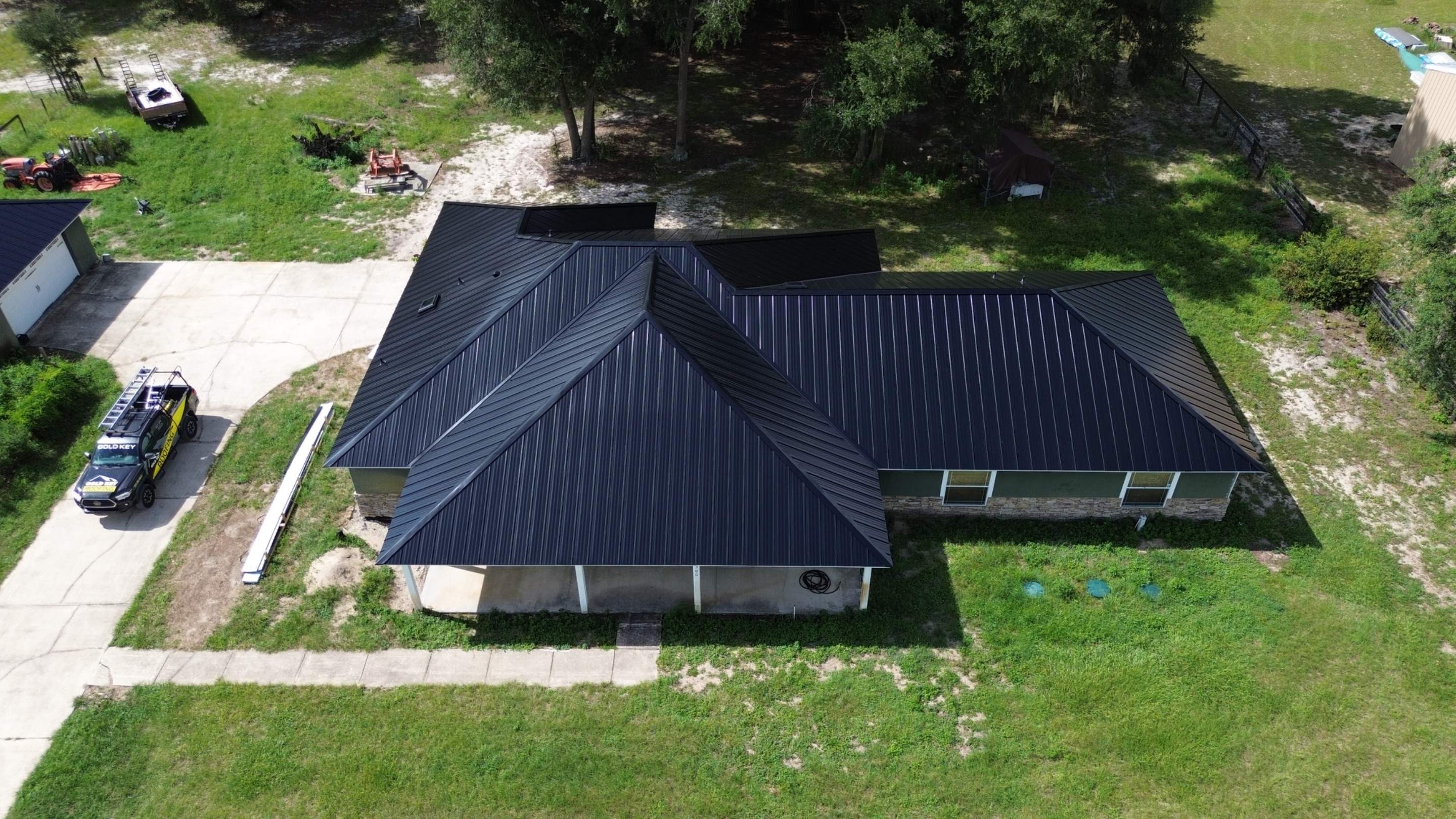 Residential Reroof | Architectural Shingles to 26 Gauge Standing Seam Metal | Groveland Fl by Gold Key Roofing