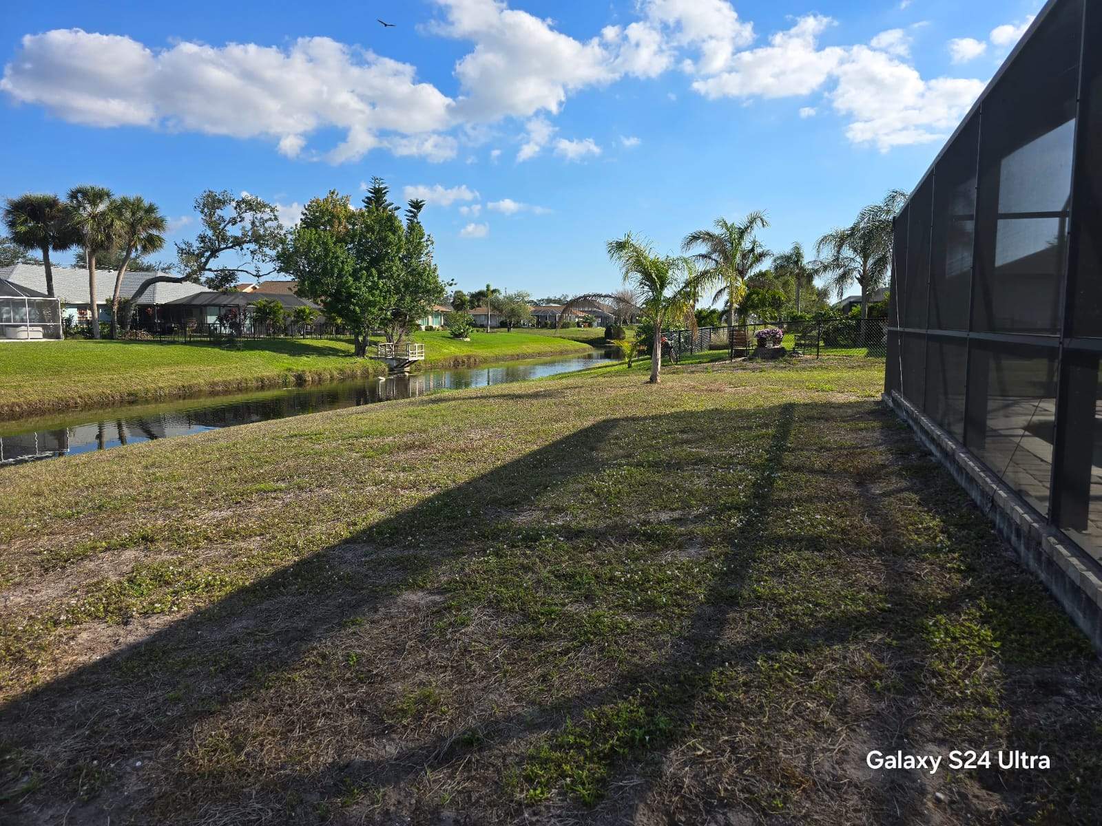 Waterfront Black Chain Link Fence Installation in Rotonda West by True Fence LLC