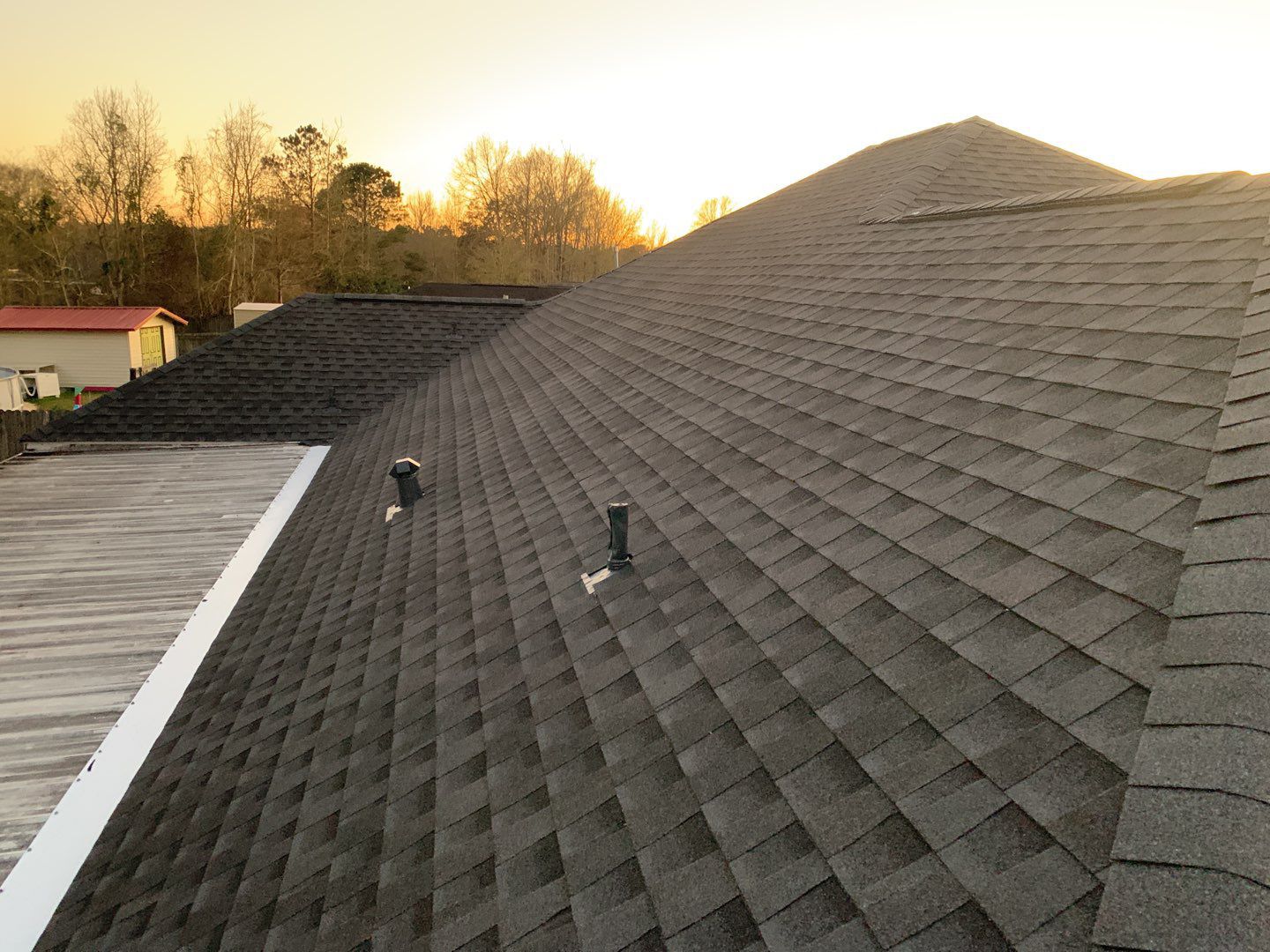 Residential Roofing Installation using Roof Replacement by American Roofing & Construction LLC