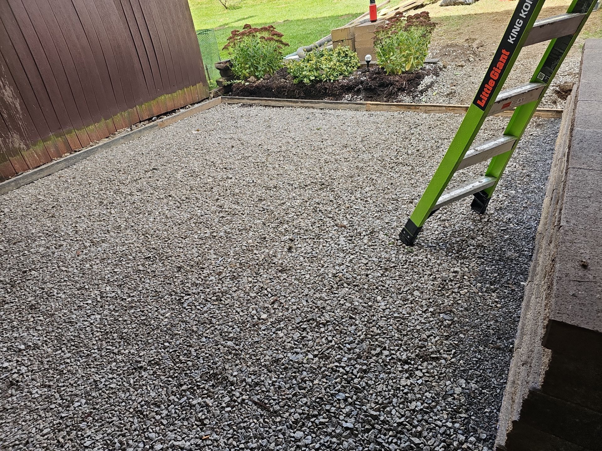 Stamped concrete and redeck  by Cousins Roofing Siding & Decks