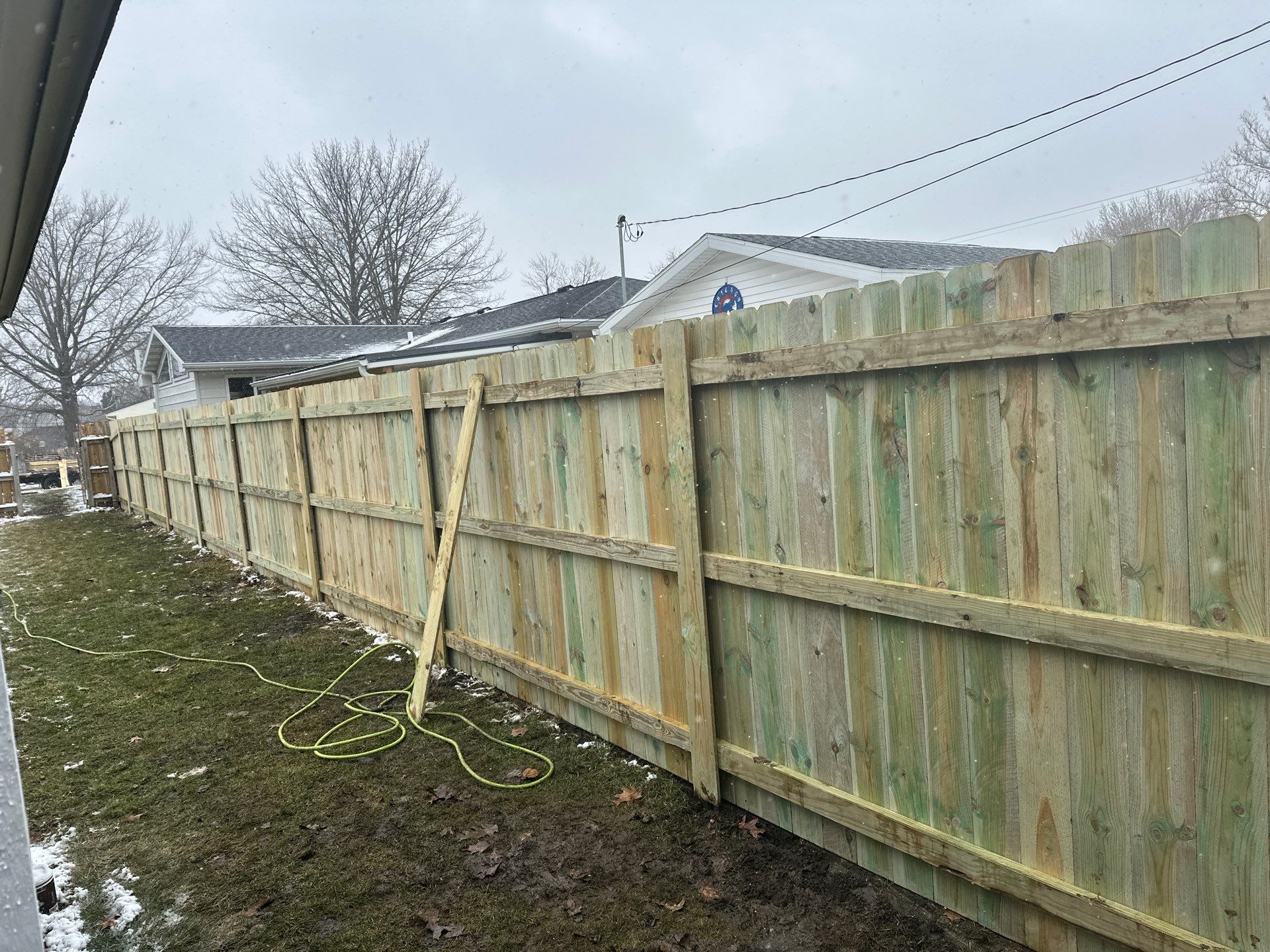Pressure-Treated Wood Privacy Fence Replacement in Waterloo by Perfect Picket Fence and Stain
