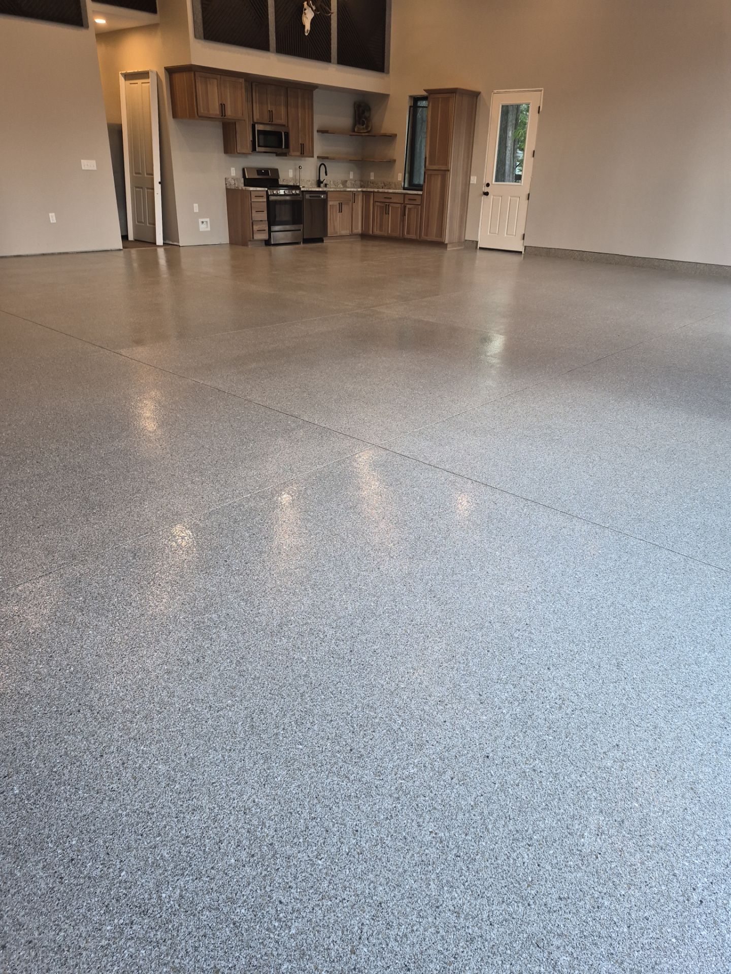Quartzite Hybrid Garage Floor Coating Installation in Coolin, Idaho by Croc Coatings, LLC