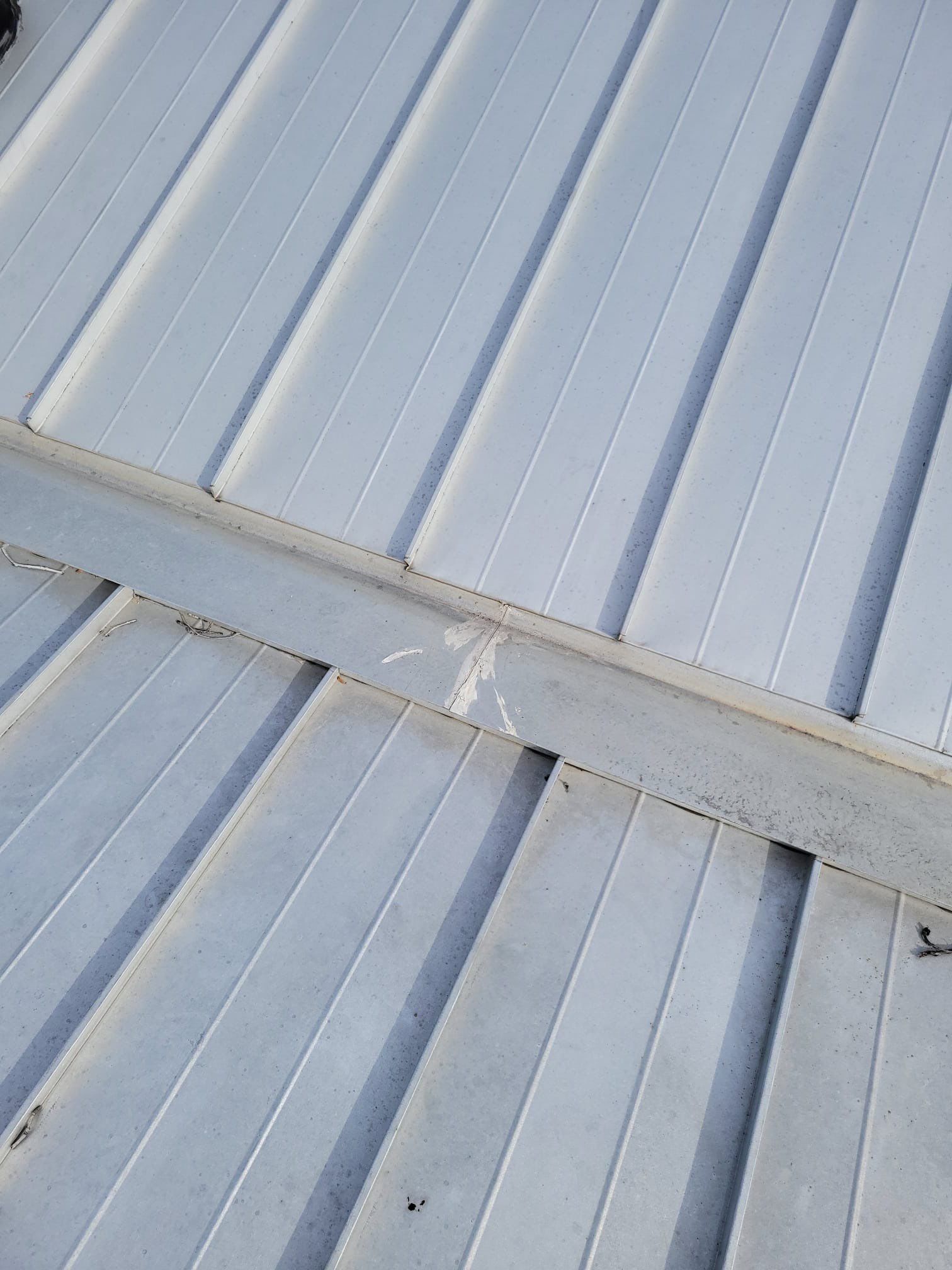 Residential Roofing Repair using Gulf Coast Metals Gulf Seam Panels by Four Peaks Roofing