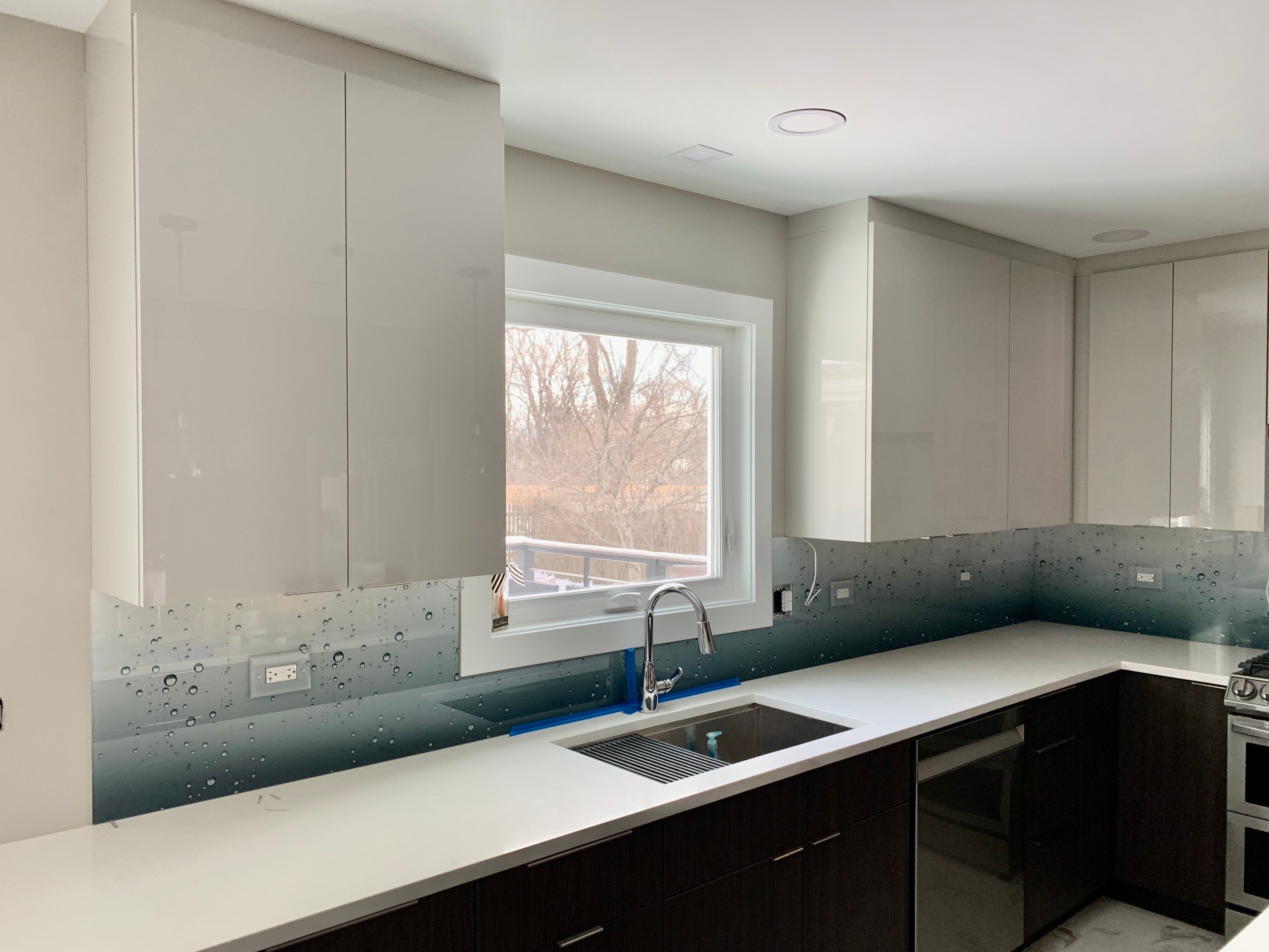 Let It Rain Kitchen Remodel using IMAGIO Solid Glass Backsplash by IMAGIO