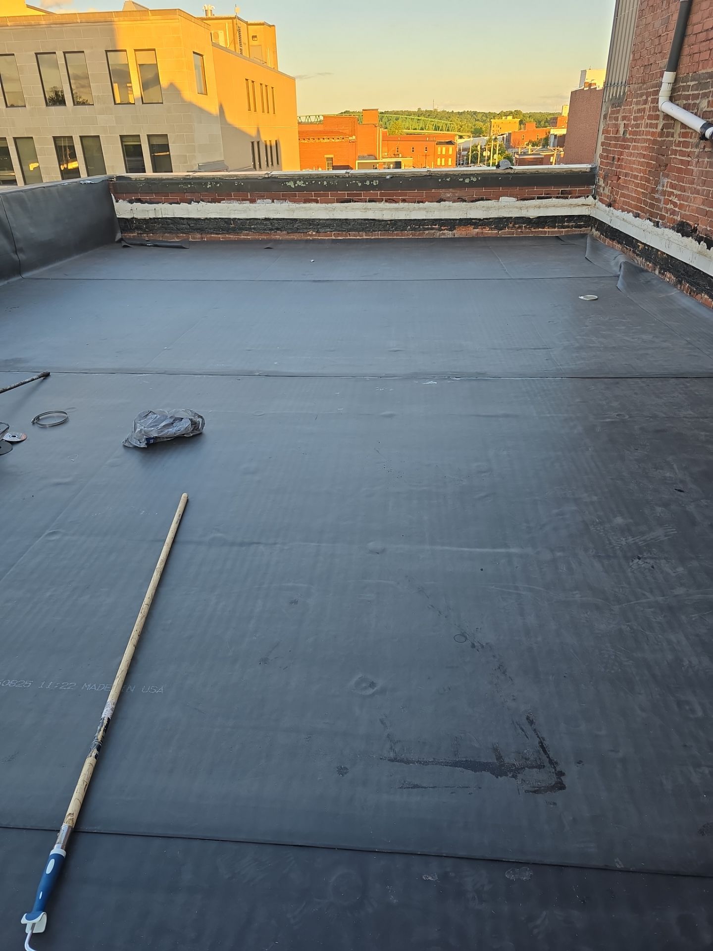 Commercial Roofing Installation using EPDM  by Rainstoppers Roofing