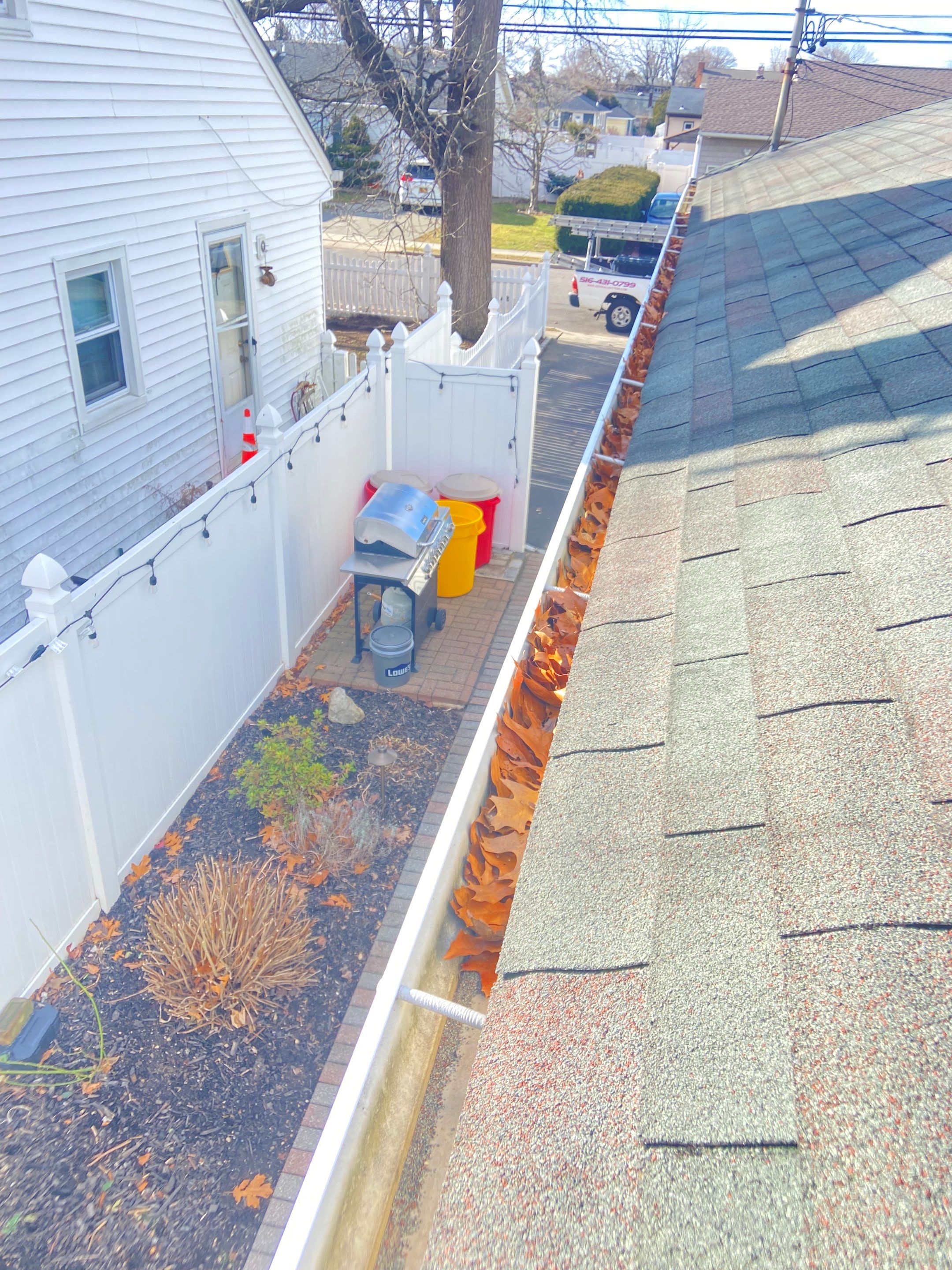 Gutter Cleaning Bethpage by Above All Gutters