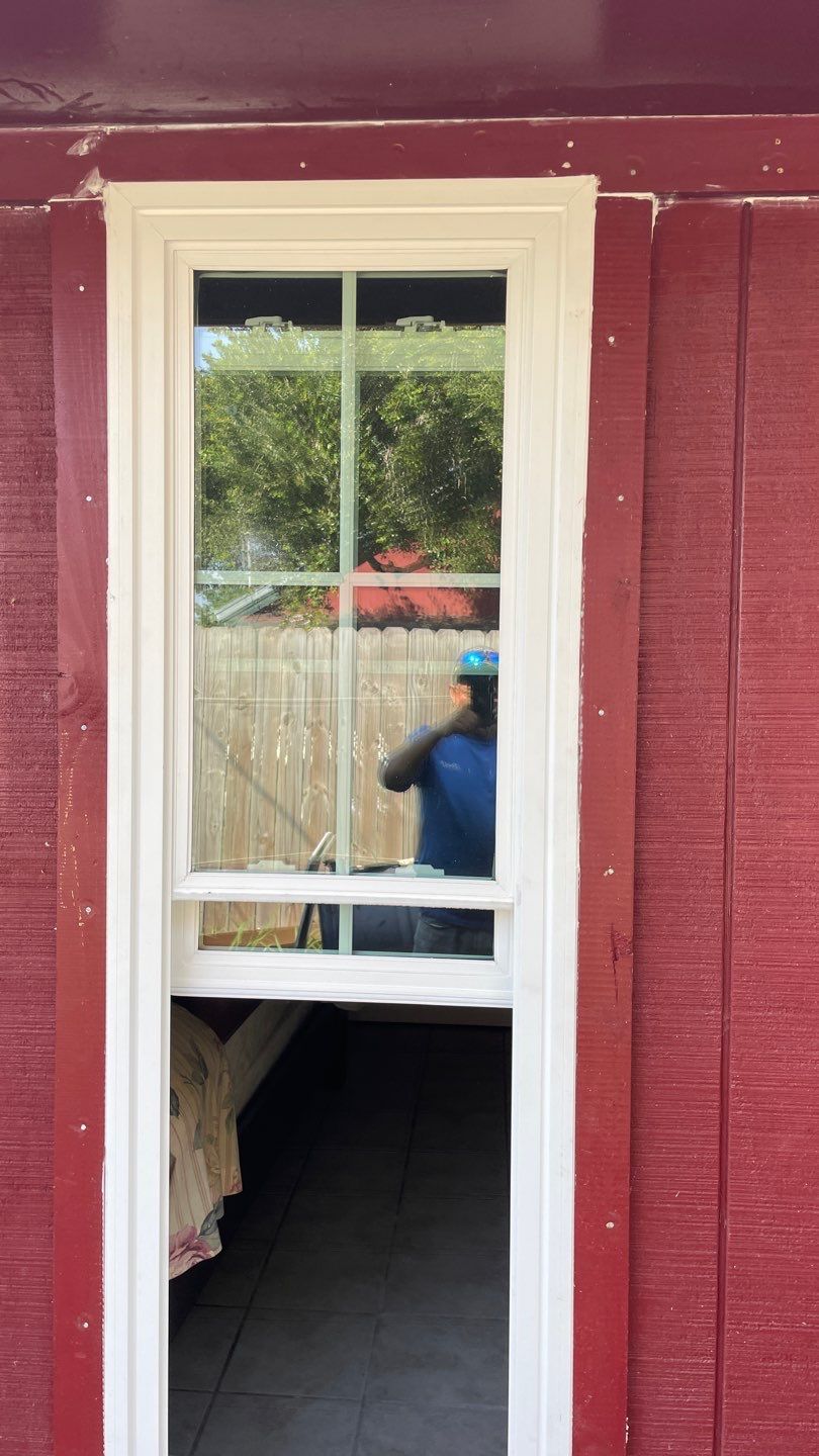 Black and white and red all over by Bayfront Roofing and Construction