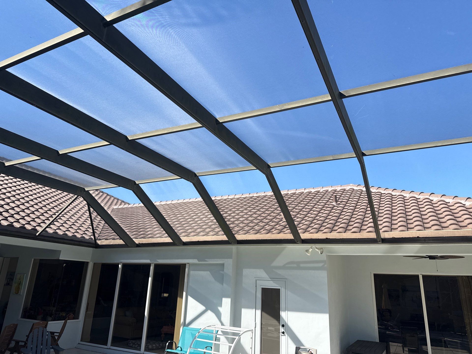 Painted Pool Deck, Lanai & Pool Cage Cleaning in River Club South – Bradenton, FL by Sunshine AquaWash