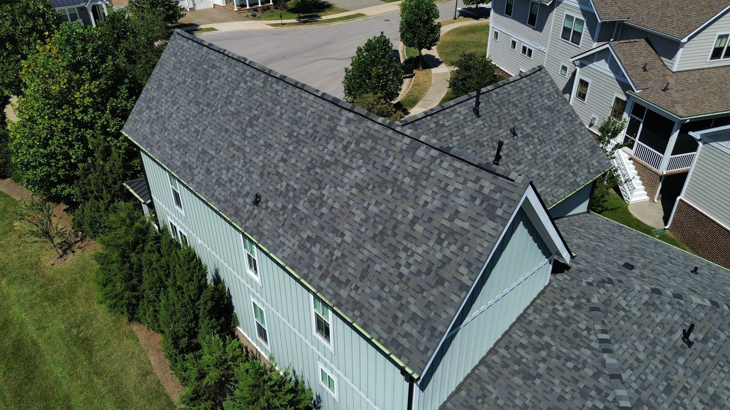 Residential Roof Replacement and Bronze Gutter Installation in Franklin by Shinglesmiths Roofing