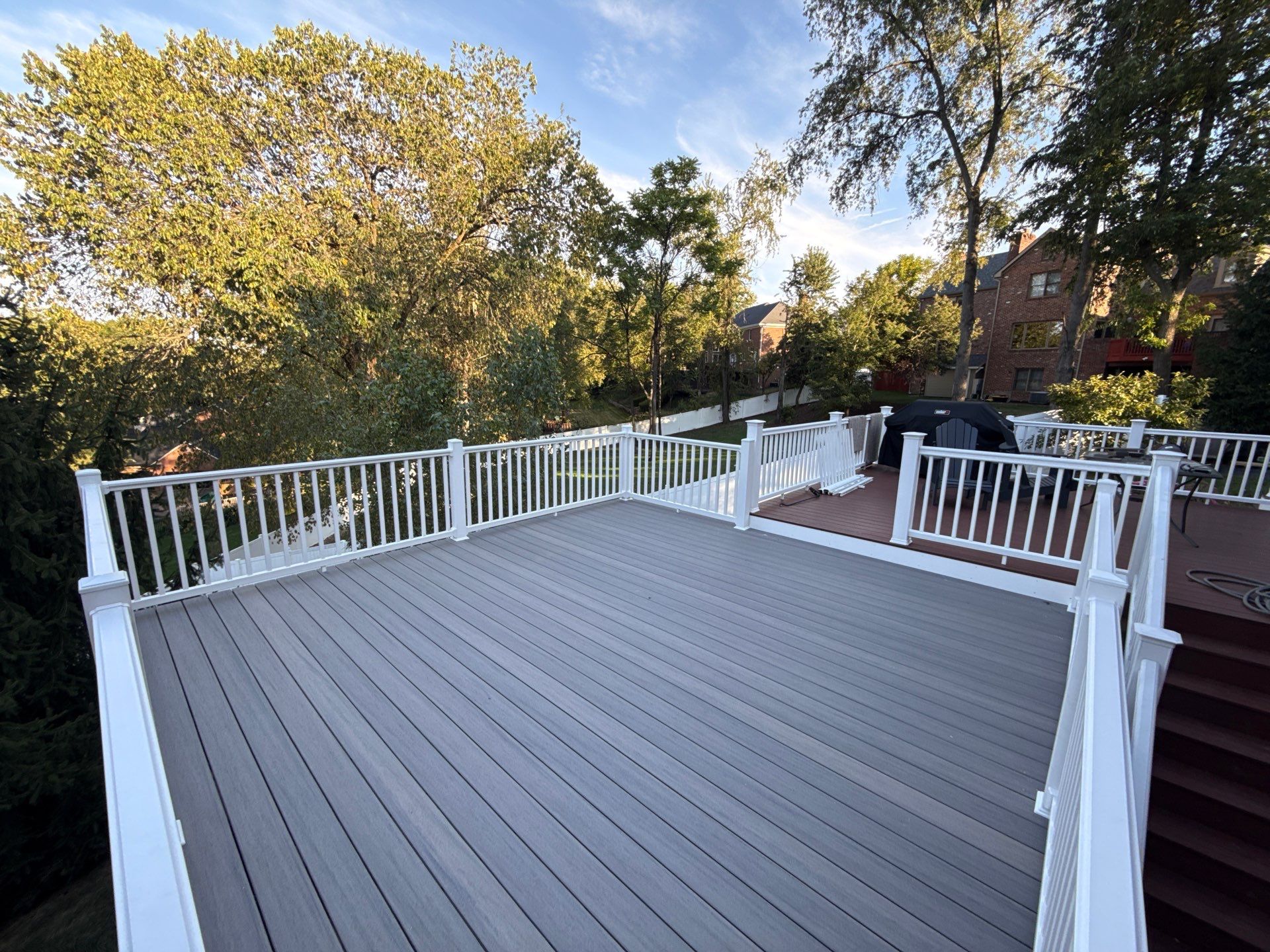 Deck extension  by Cousins Roofing Siding & Decks