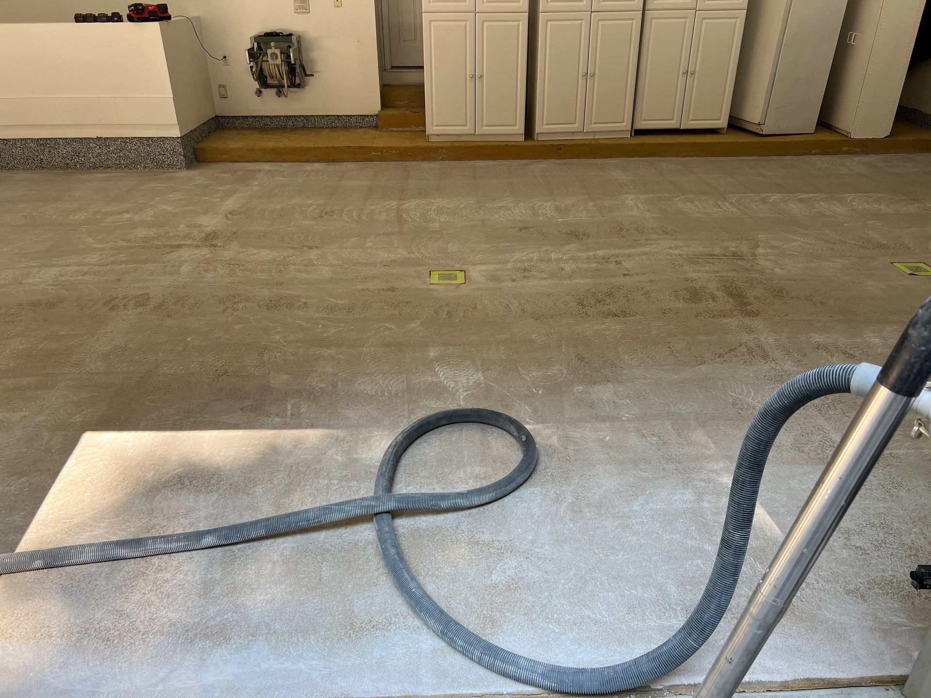 Exterior Siding Repairs and Epoxy Flake Floor in Spring Lake by Gordon Painting