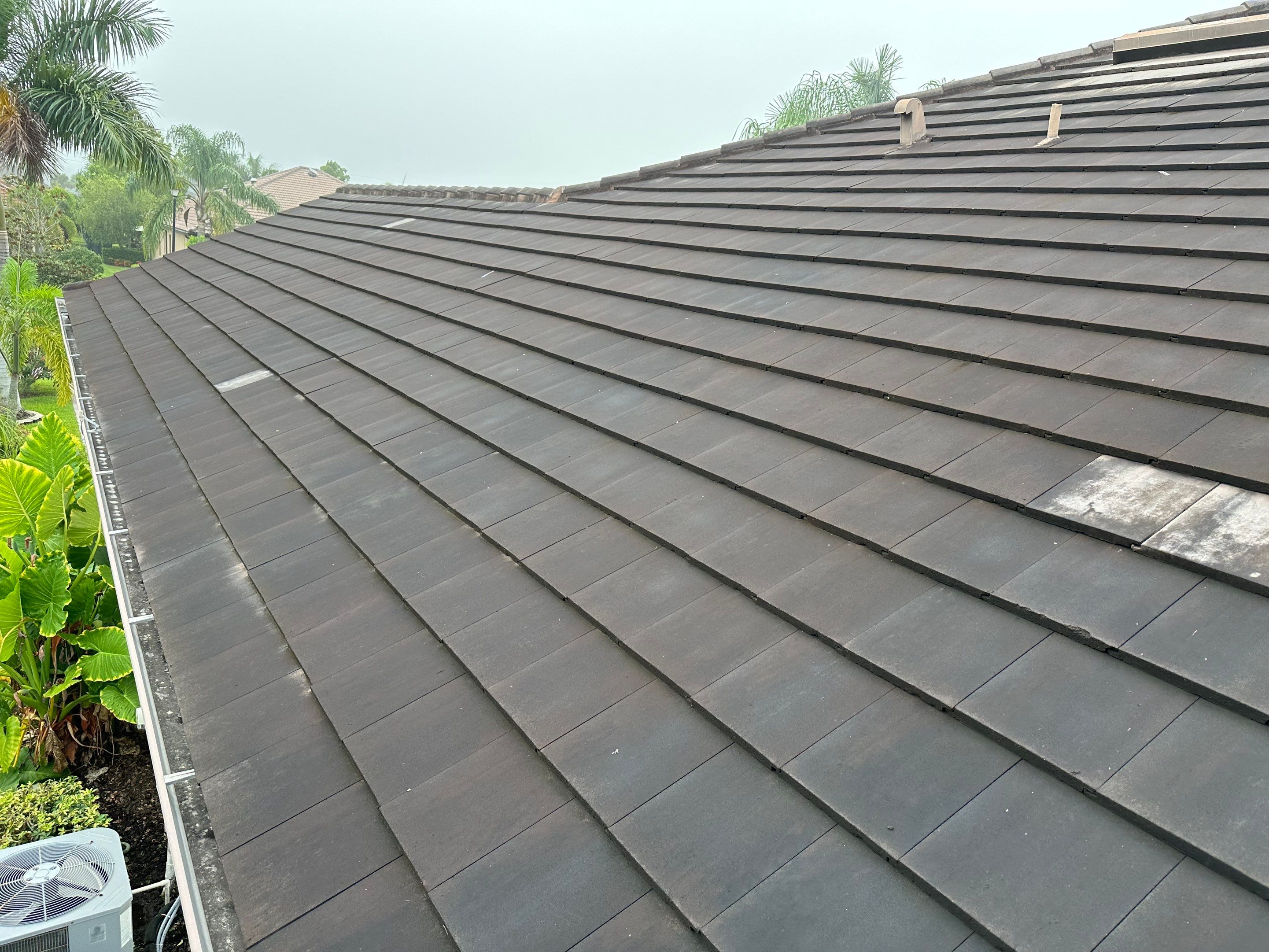Flat Tile Roof Cleaning, House Wash & Sidewalk Cleaning in Enclave at Country Meadows, Bradenton, FL | Sunshine AquaWash by Sunshine AquaWash