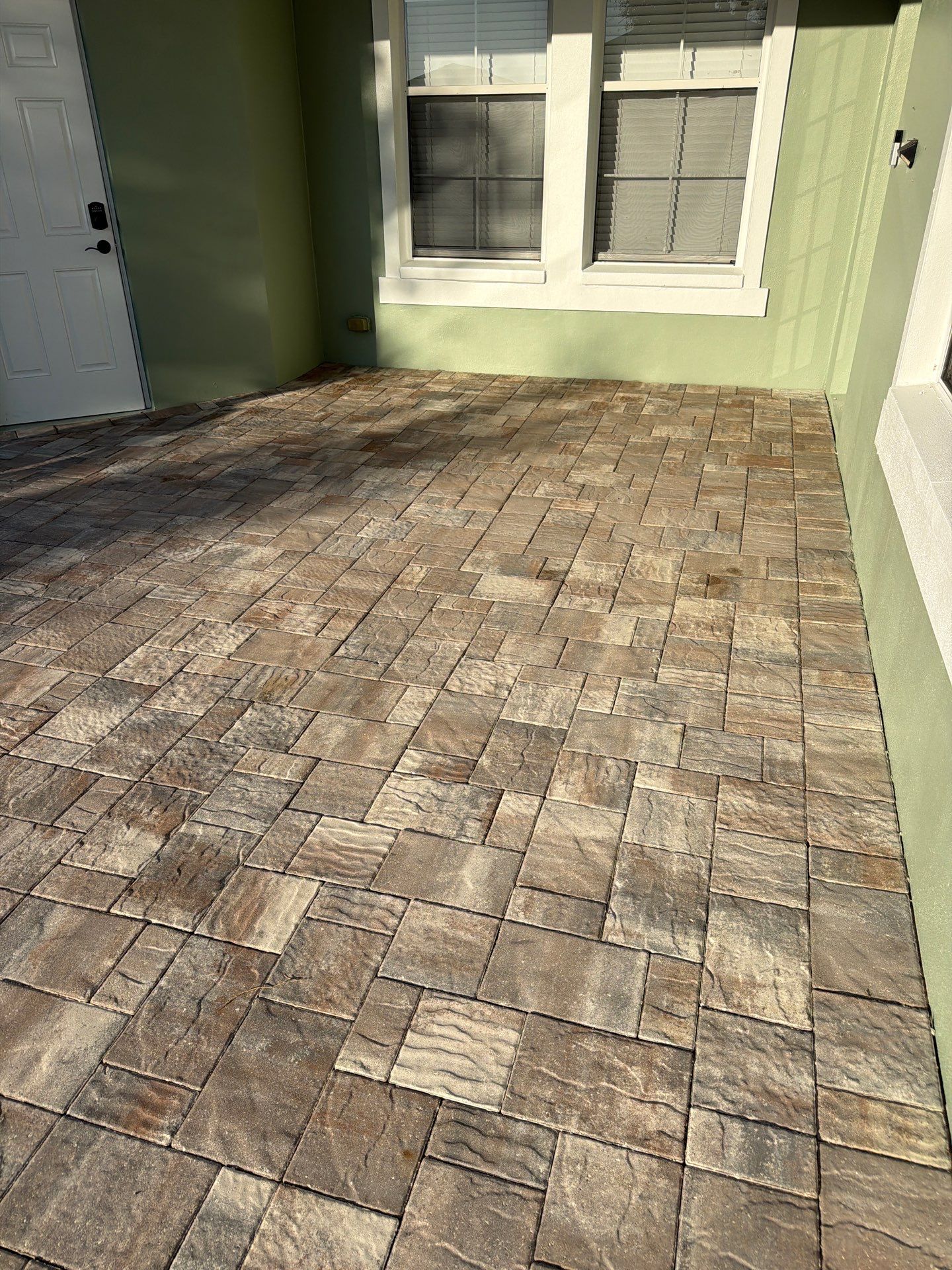 Multi-Toned Paver Patio and Walkway sealing in Mira Bay Apollo Beach by Supreme Paver Experts