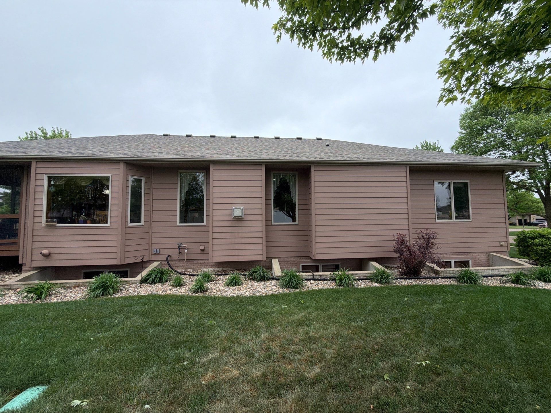 Exterior Painting and Wooden Deck Staining in Sioux Falls by Select Painting, Coatings & Garage Cabinets