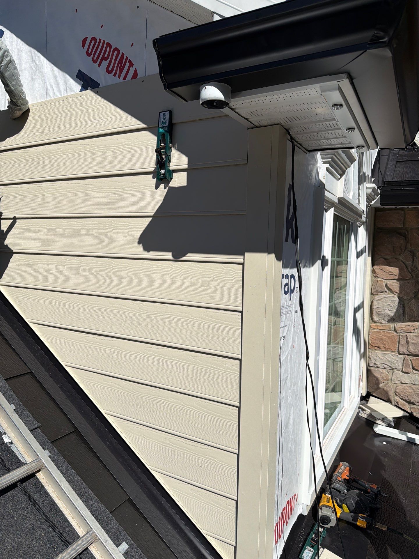 Beautiful James Hardie Siding & Tesla Solar Roof by American Home Contractors