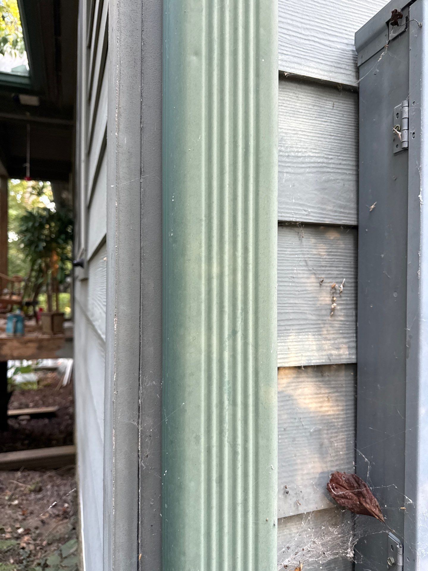 Custom Green Downspout Installation and Exterior Drainage in Pegram by Stellar Roofing & Restorations 
