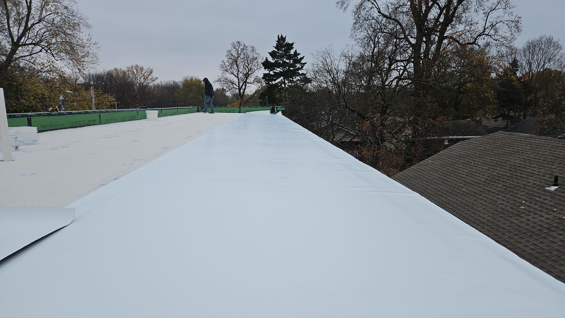 Commercial Flat Roof Install - Single-Ply Membrane  by Titan Commercial & Residential Roofing 