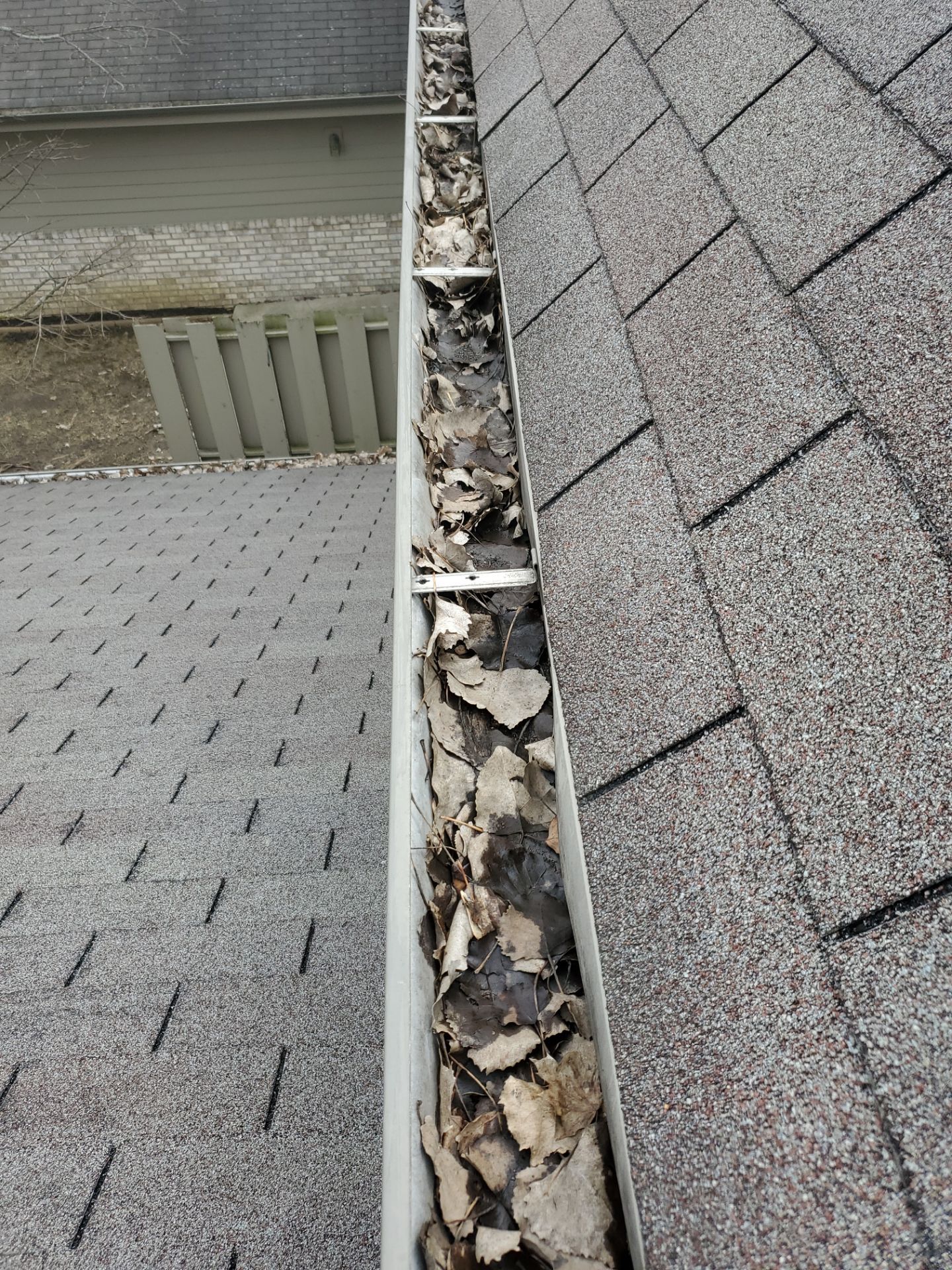 HOA gutter cleaning before photo