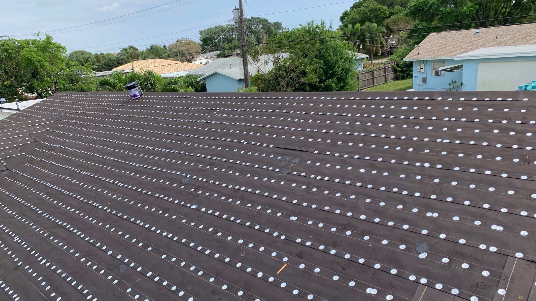 Residential Roofing Installation using 1" Nail strip metal roof by BLUES BROTHERS ROOFING