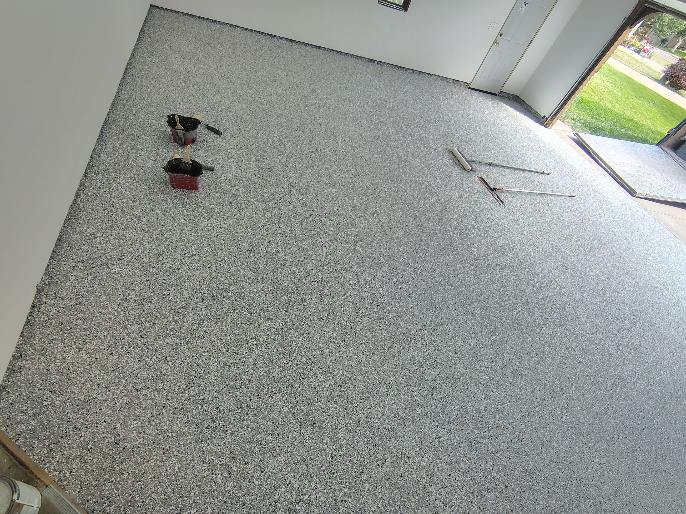 Sioux Falls Garage Floor Coating with Speckled Flake Finish by Select Painting, Coatings & Garage Cabinets