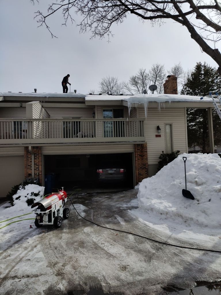 Ice Dam Removal in Eden Prairie by Next Level Seamless Gutters / Exteriors Inc.
