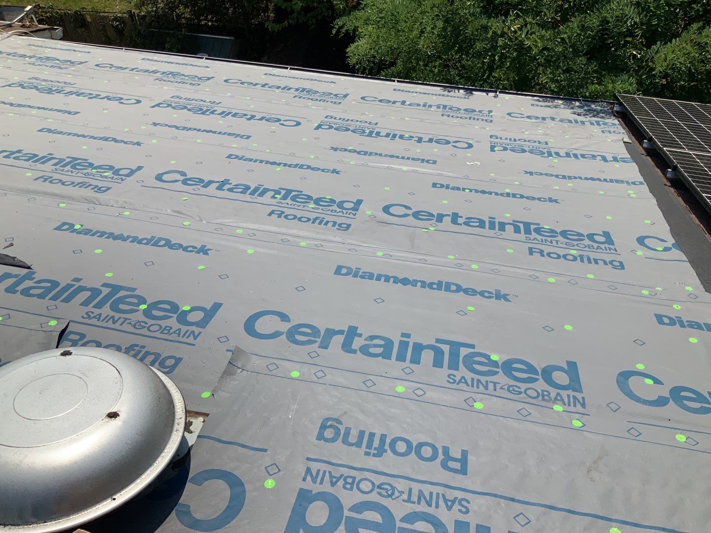 Residential Roofing Installation using Landmark Shingles Color Weatherwood by Alpha Design Services
