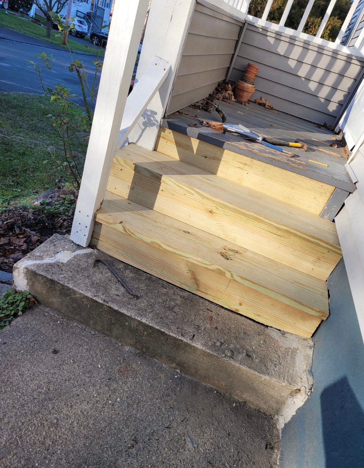 Deck Installation using Pressure treated railing by A Plus Exterior