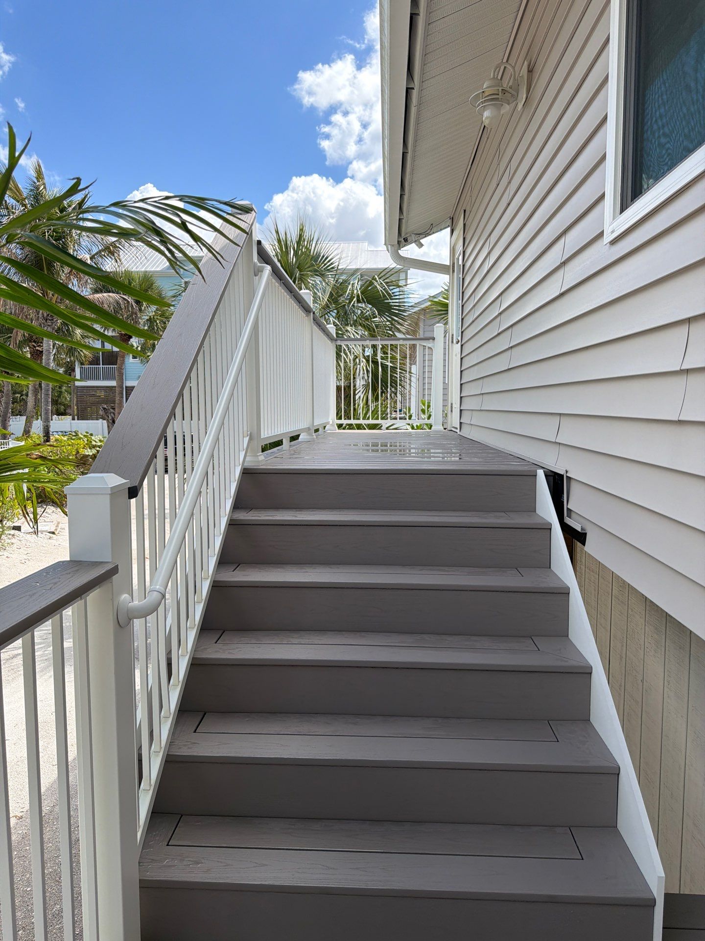 Elevated Deck and Composite Staircase Replacement in Placida Florida by Smirnov Construction Inc