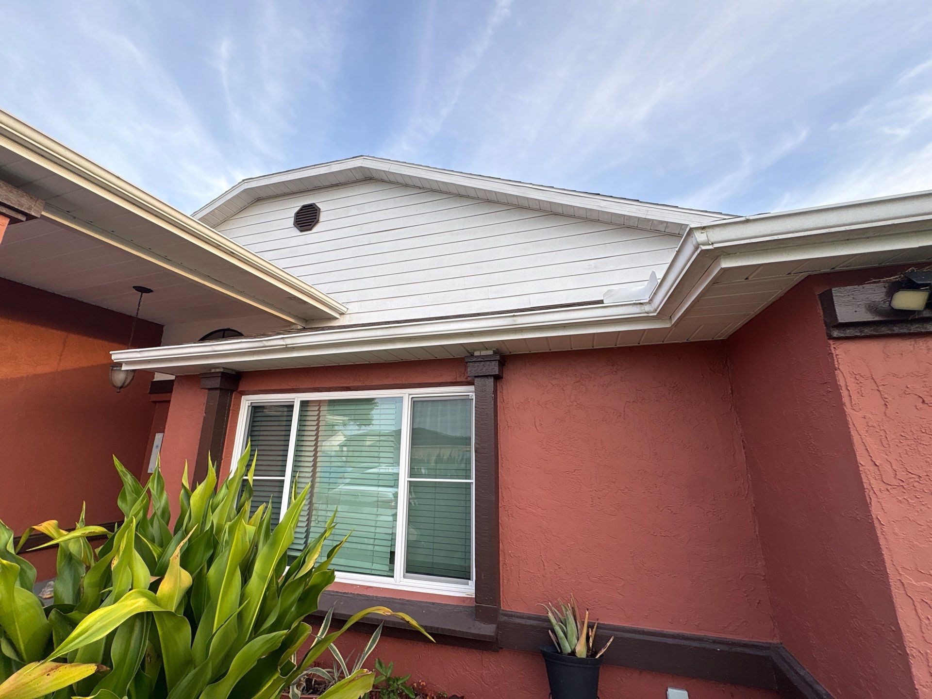 Residential Metal Roofing Installation and Gutter Replacement in Kissimmee by Pinnacle Roofing Group