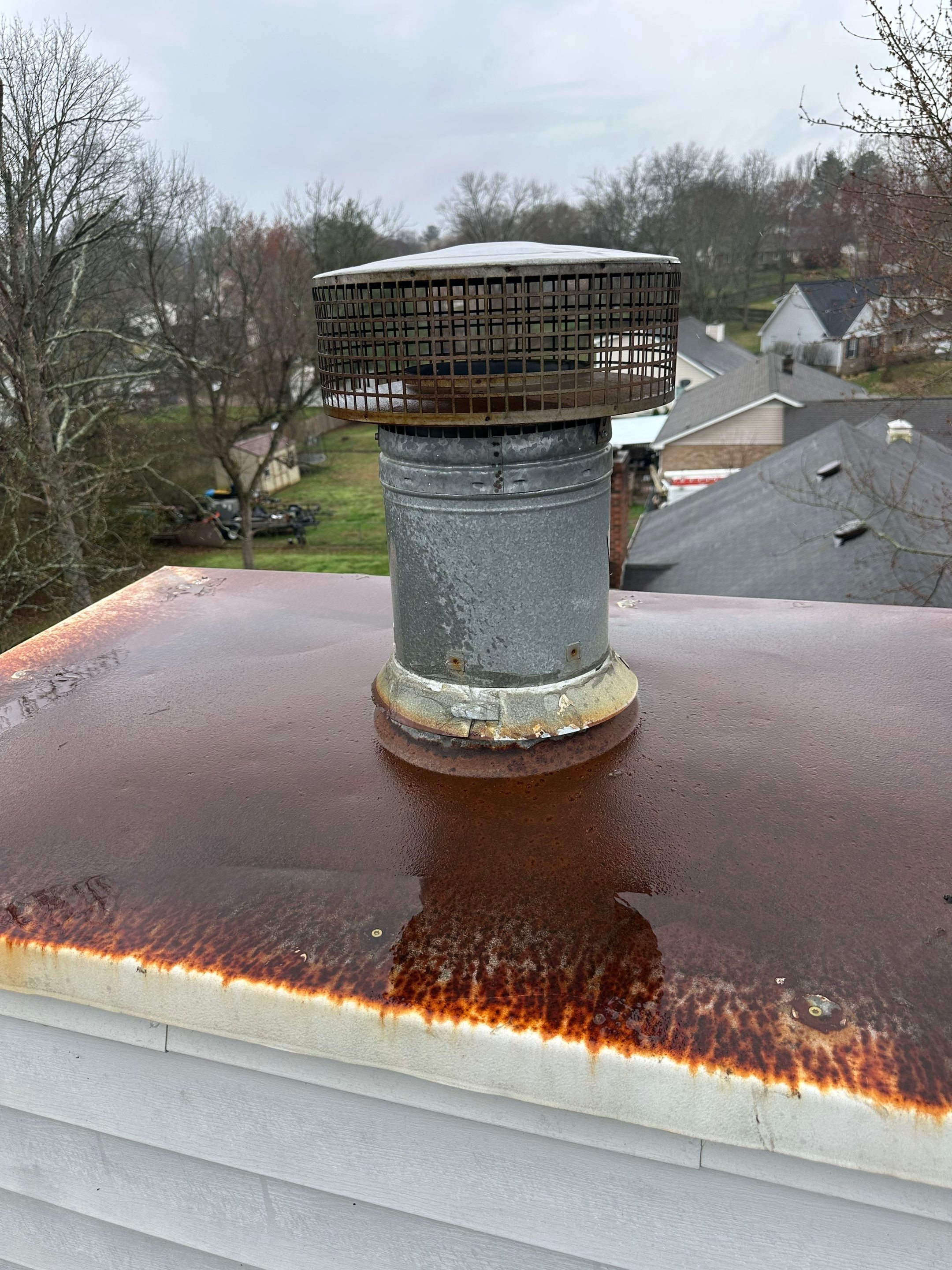 Residential Roofing Repair using Custom Fabricated Chimney Cap by Paragon Roofing