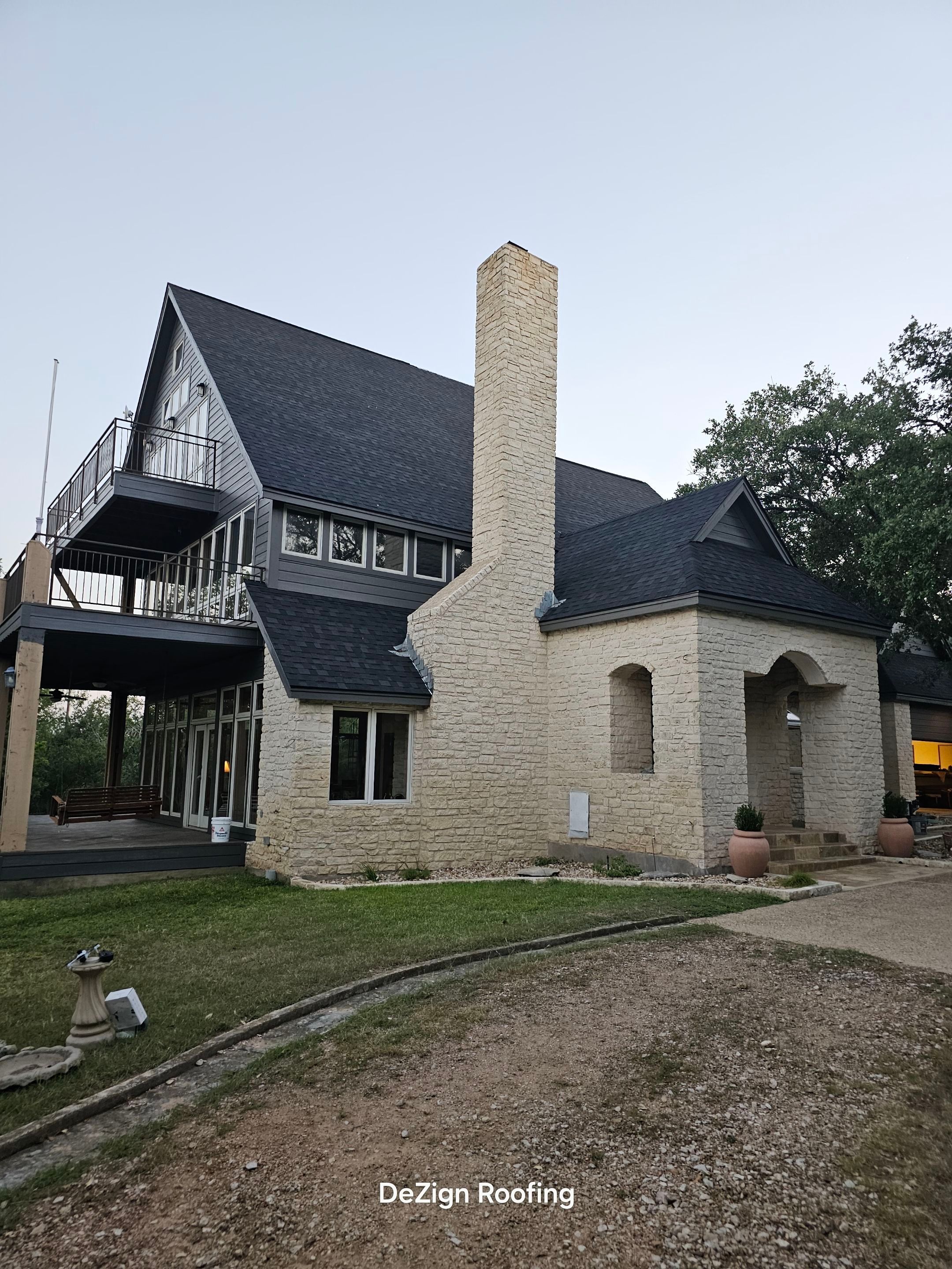 Residential Roofing Installation using IKO Nordic Granite Black by DeZign Roofing & Exteriors