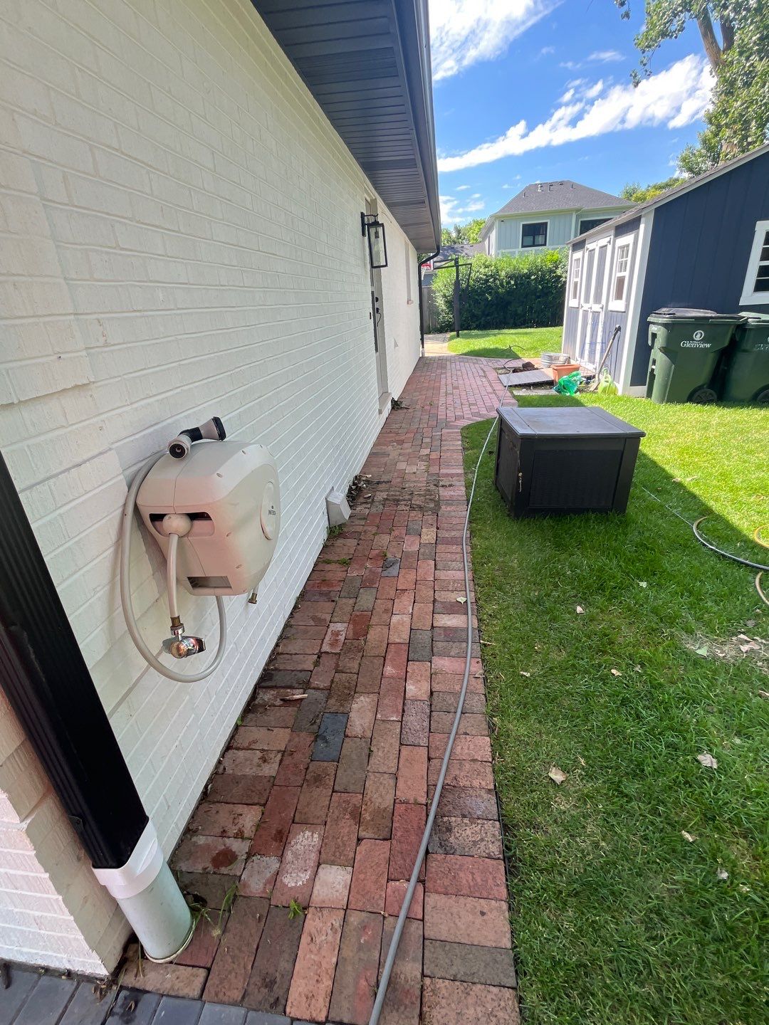 Brick paver repair, cleaning and sealing by Northern Power Washing LLC.