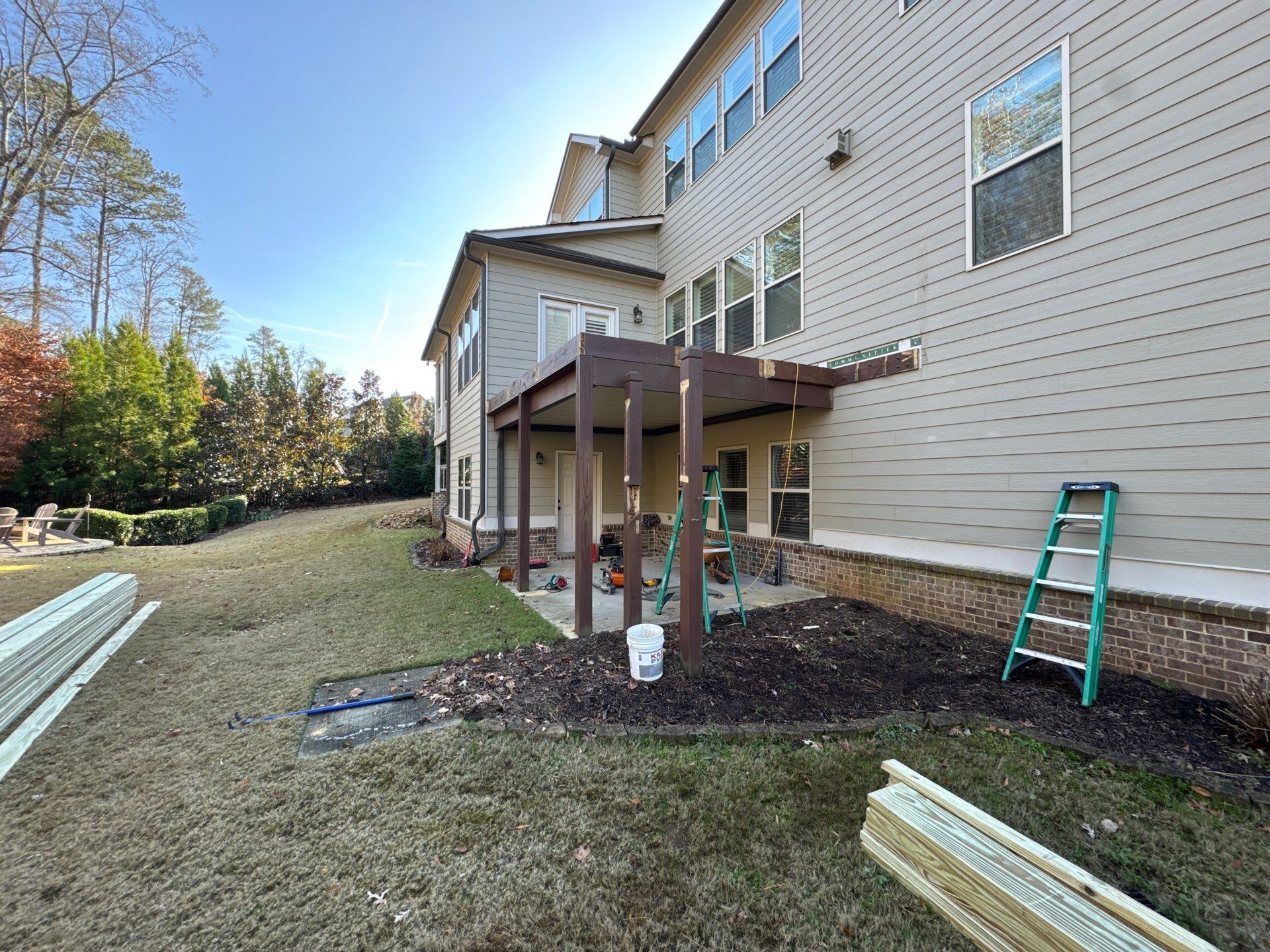 Custom Pressure-Treated Deck with Metal Balusters in Marietta by Swift Home Renovations