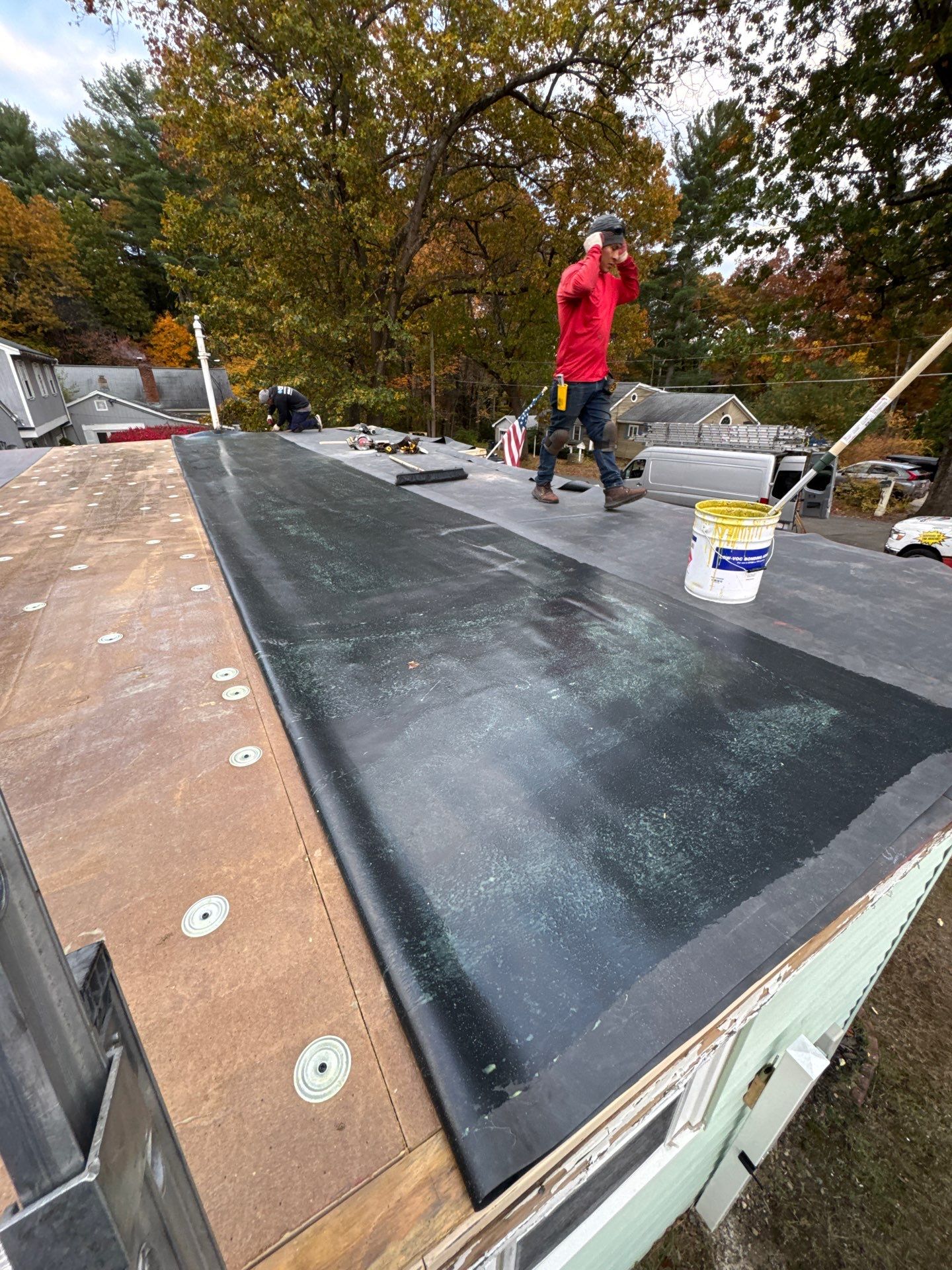 Westford EPDM Flat Roof with Gutter & Soffit/Fascia Replacement by Mighty Dog Roofing of Greater Middlesex County