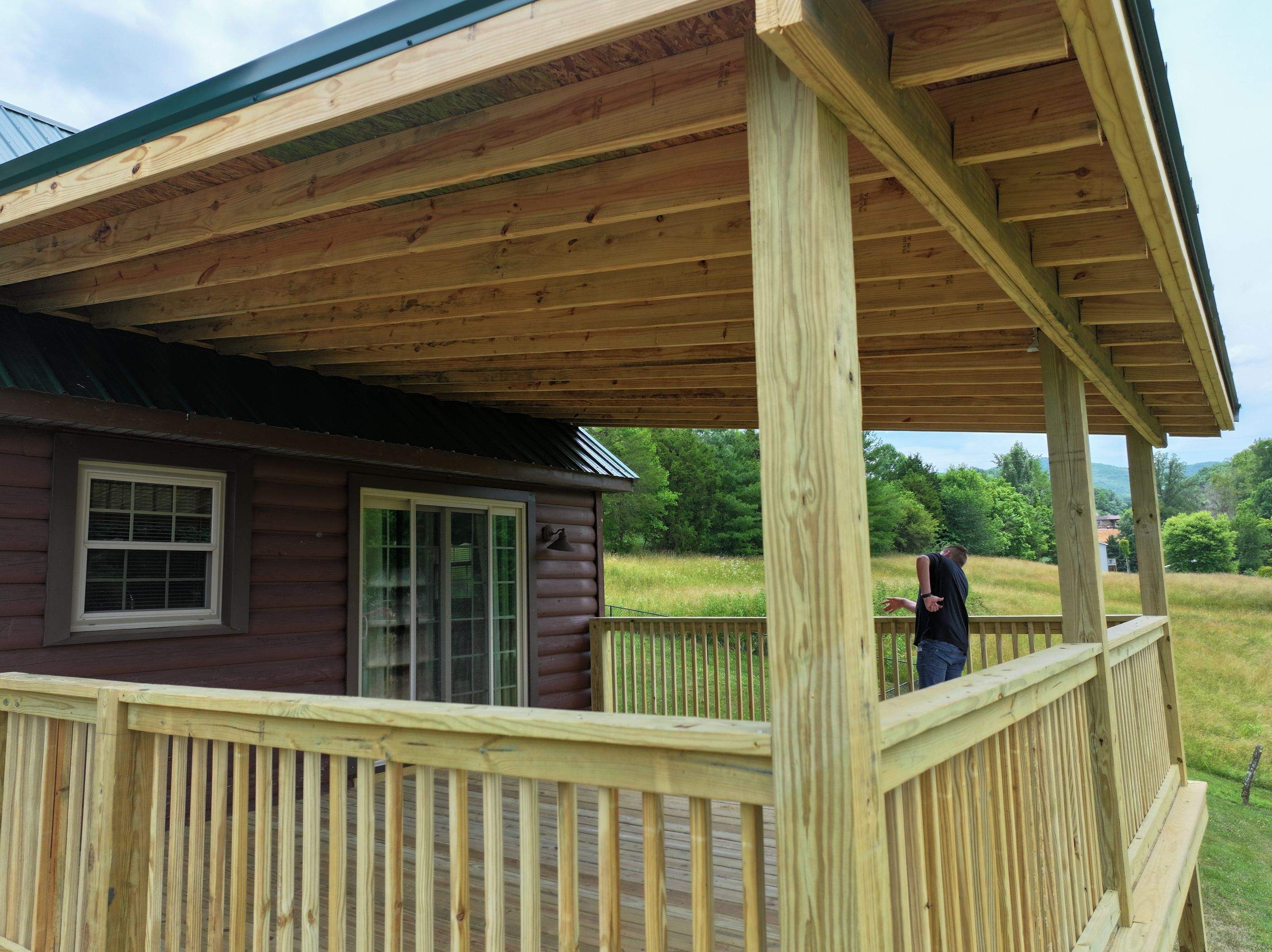 Paddle Creek Pet Ranch Cabin  by Omnia Roofing