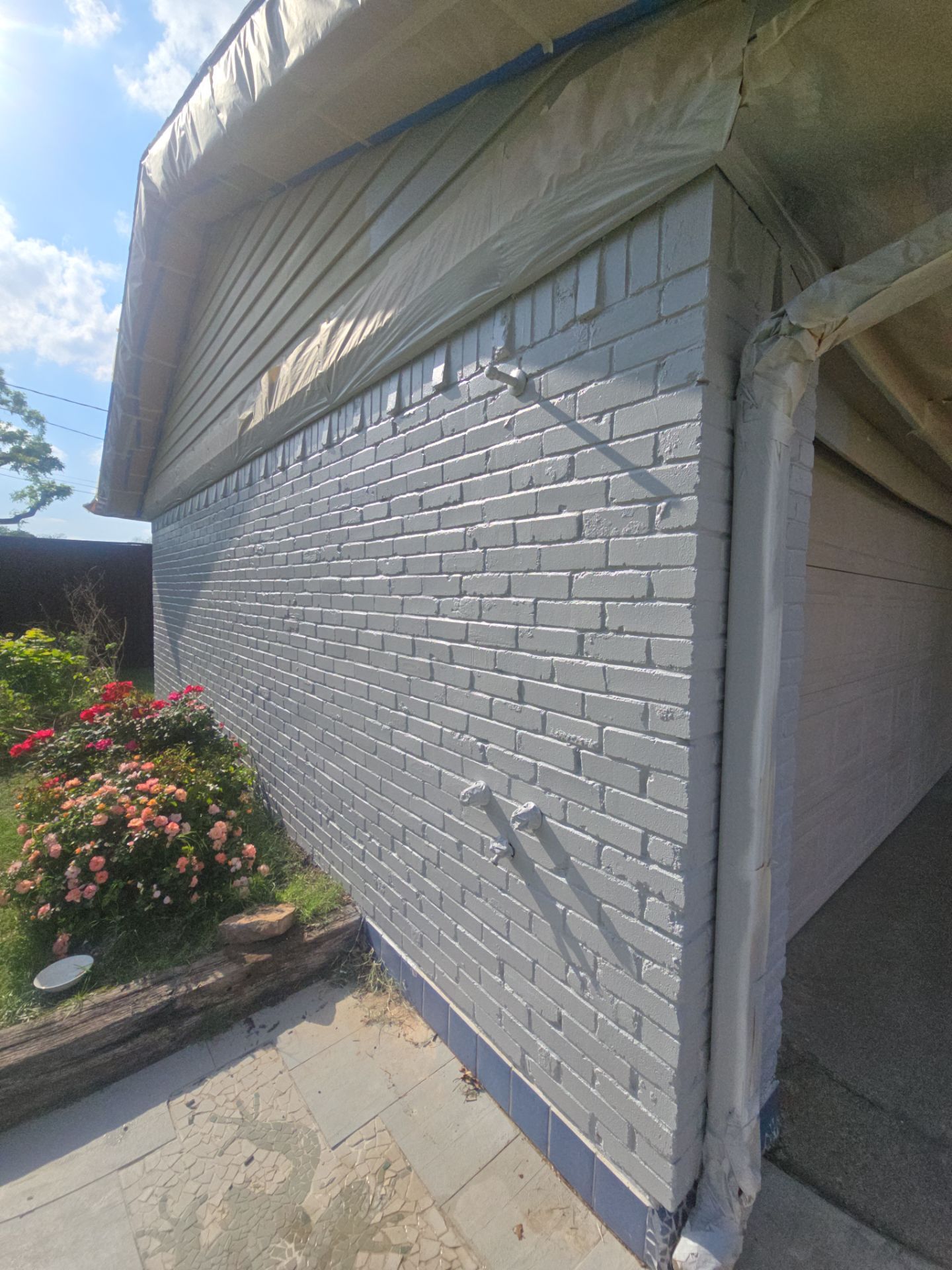 Exterior Home Paint Project with Different Surfaces by SLM General Contractors & Roofing