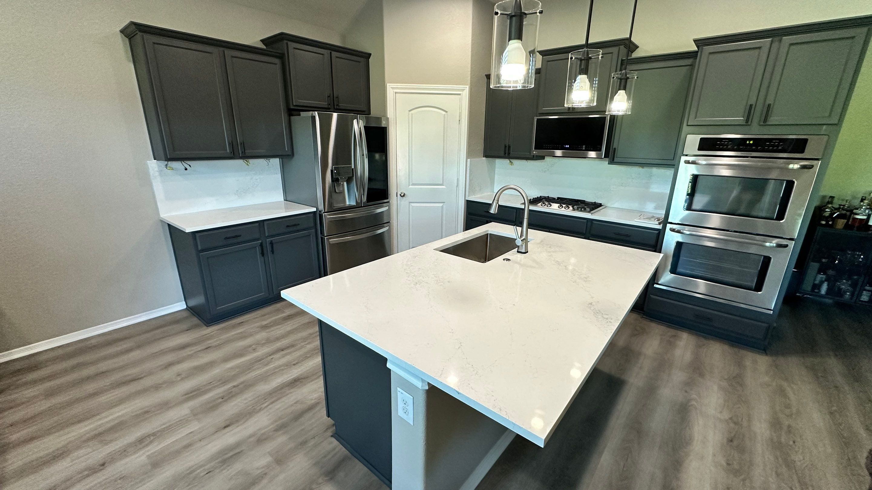 Kitchen Remodel and Outdoor Fireplace in Tomball, TX by SophAlx LLC