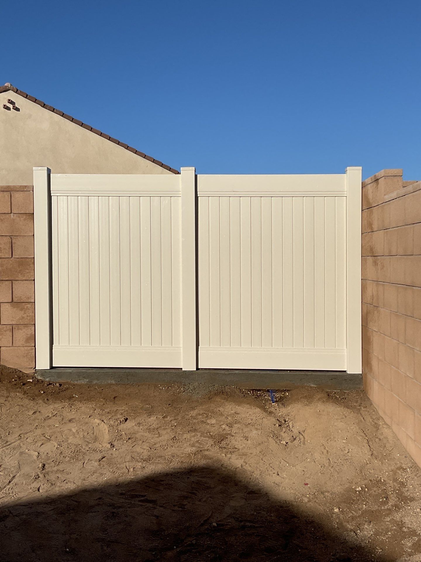 Gate installation using Vinyl by Fence Guys Inc.