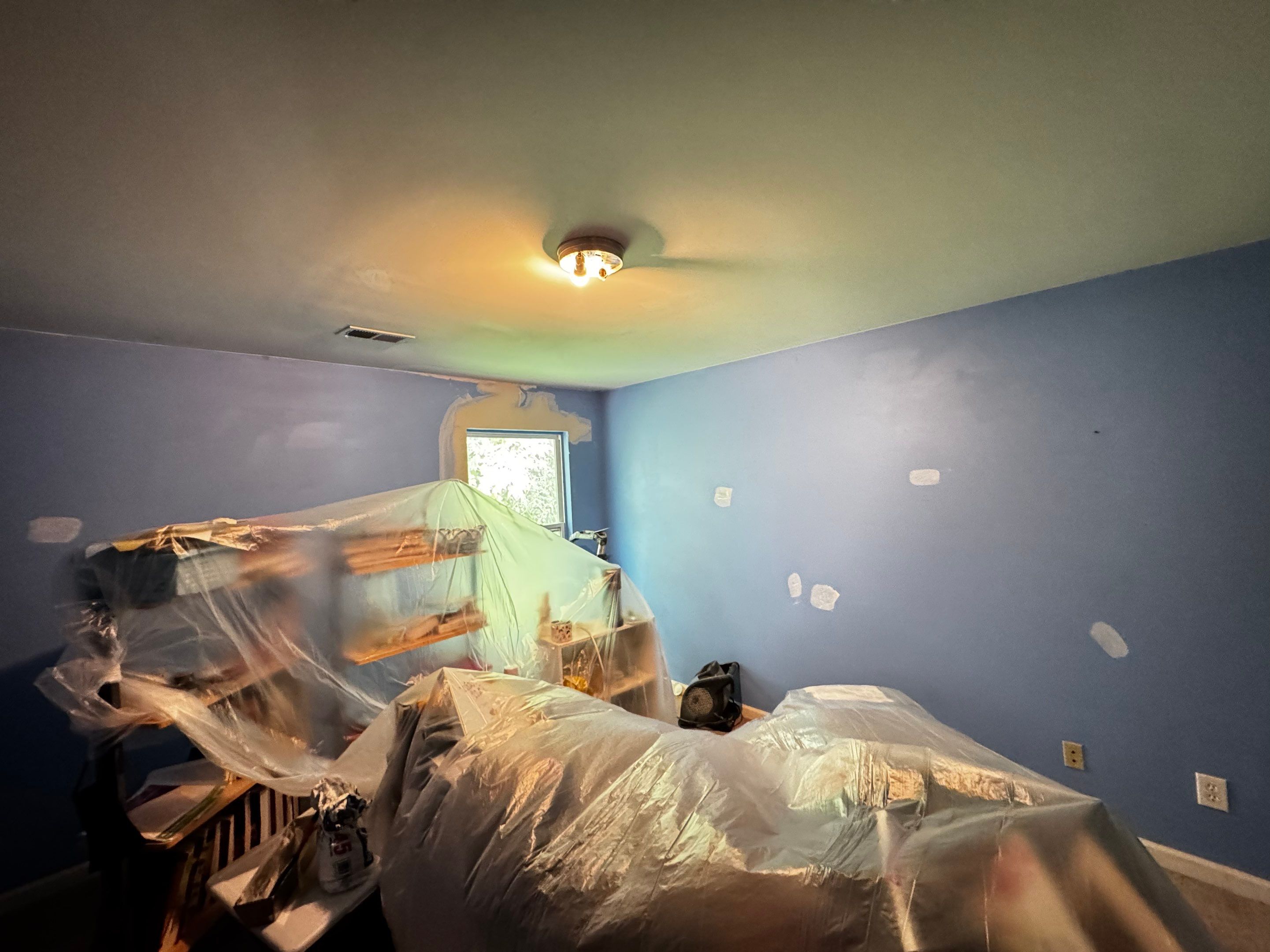Bedroom Interior Painting and Professional Drywall Repair by PGP Surface Solutions, LLC