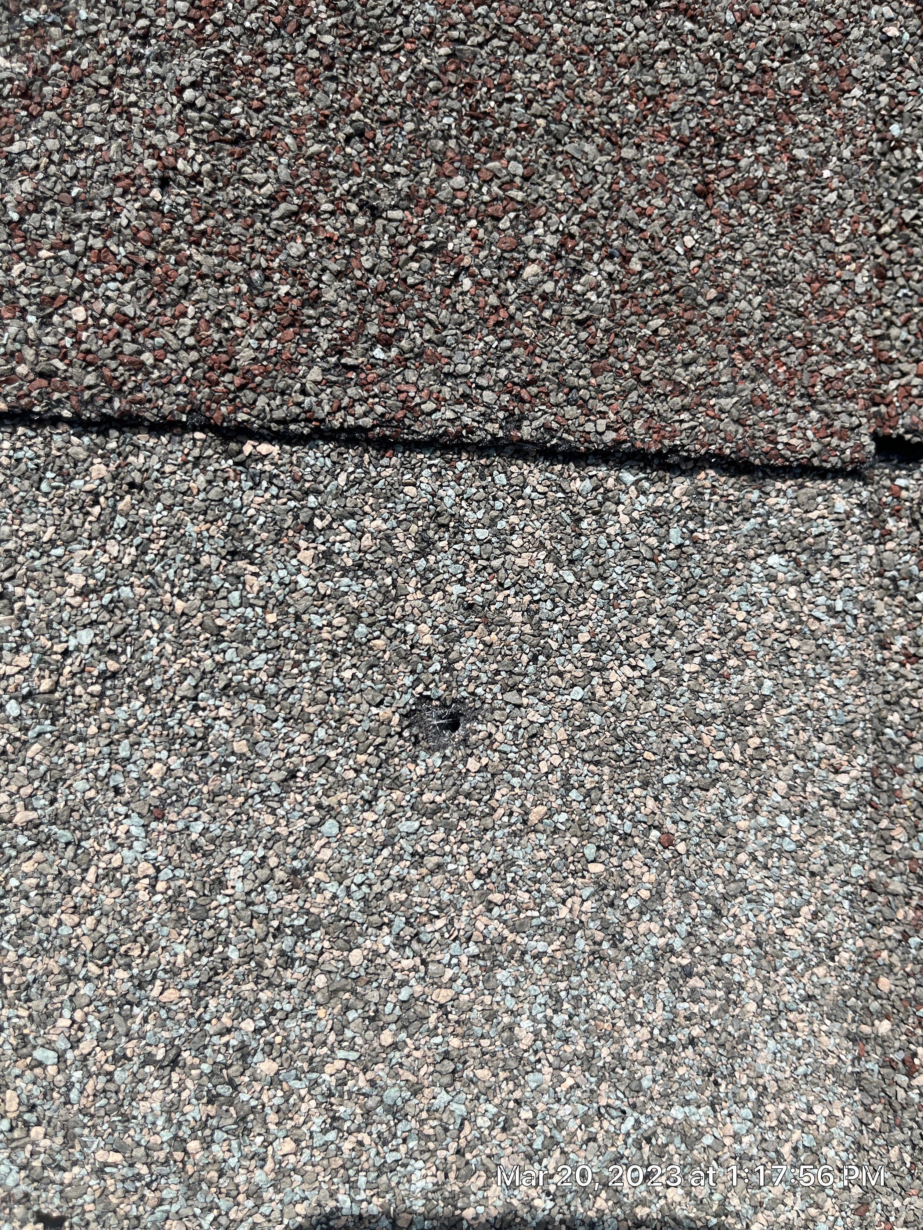 Residential Roofing Installation using 26 Gauge Colored Panels by Hostetler Roofing